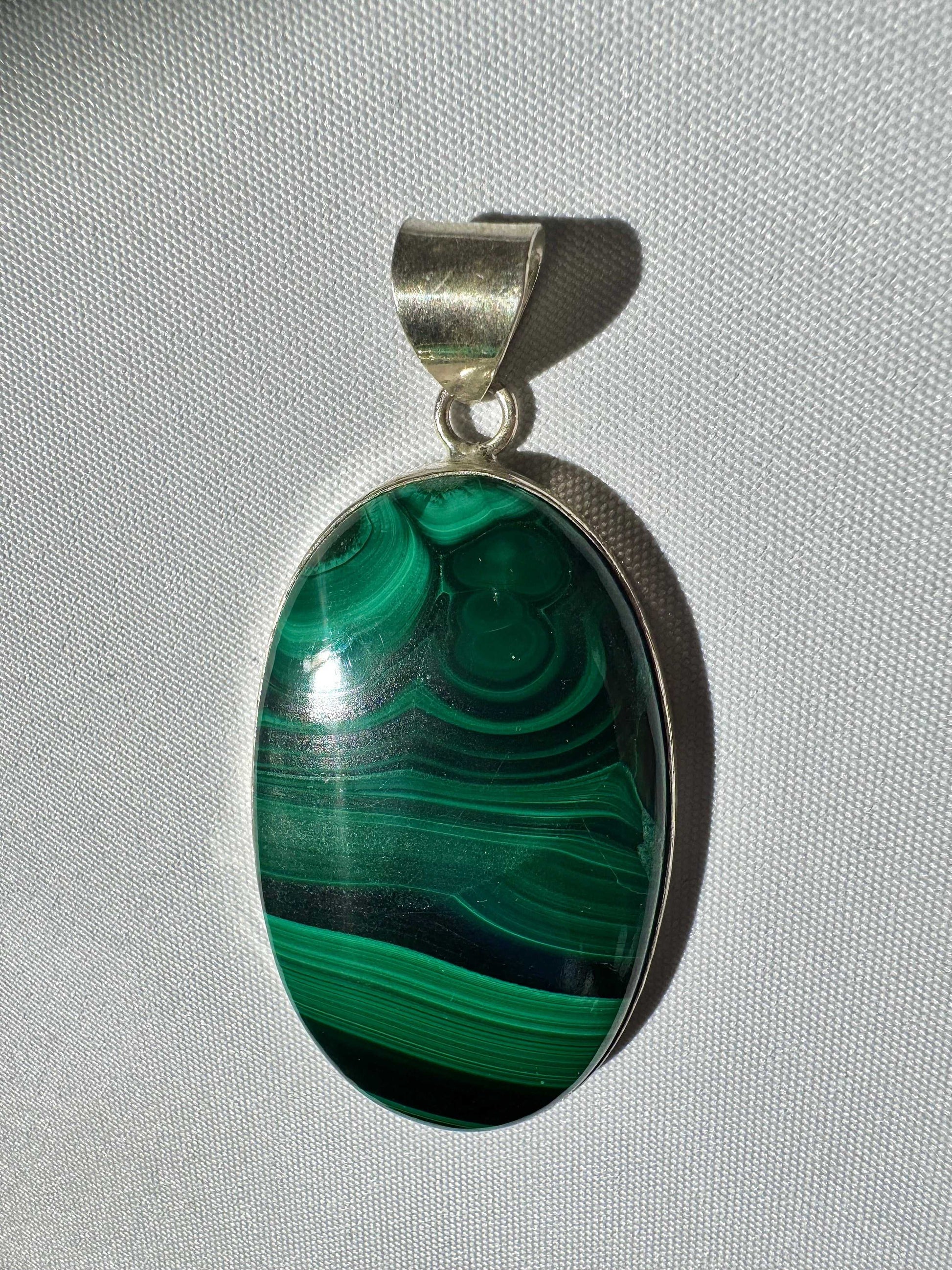 Oval Malachite Crystal Pendant for growth, insight, and protection | Crystal Jewellery NZ