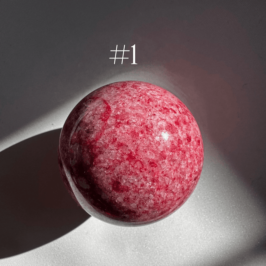 Polished Pink Thulite Crystal Sphere #1 with deep pink and white marbling, ideal for crystal collectors of rare heart-centered stones