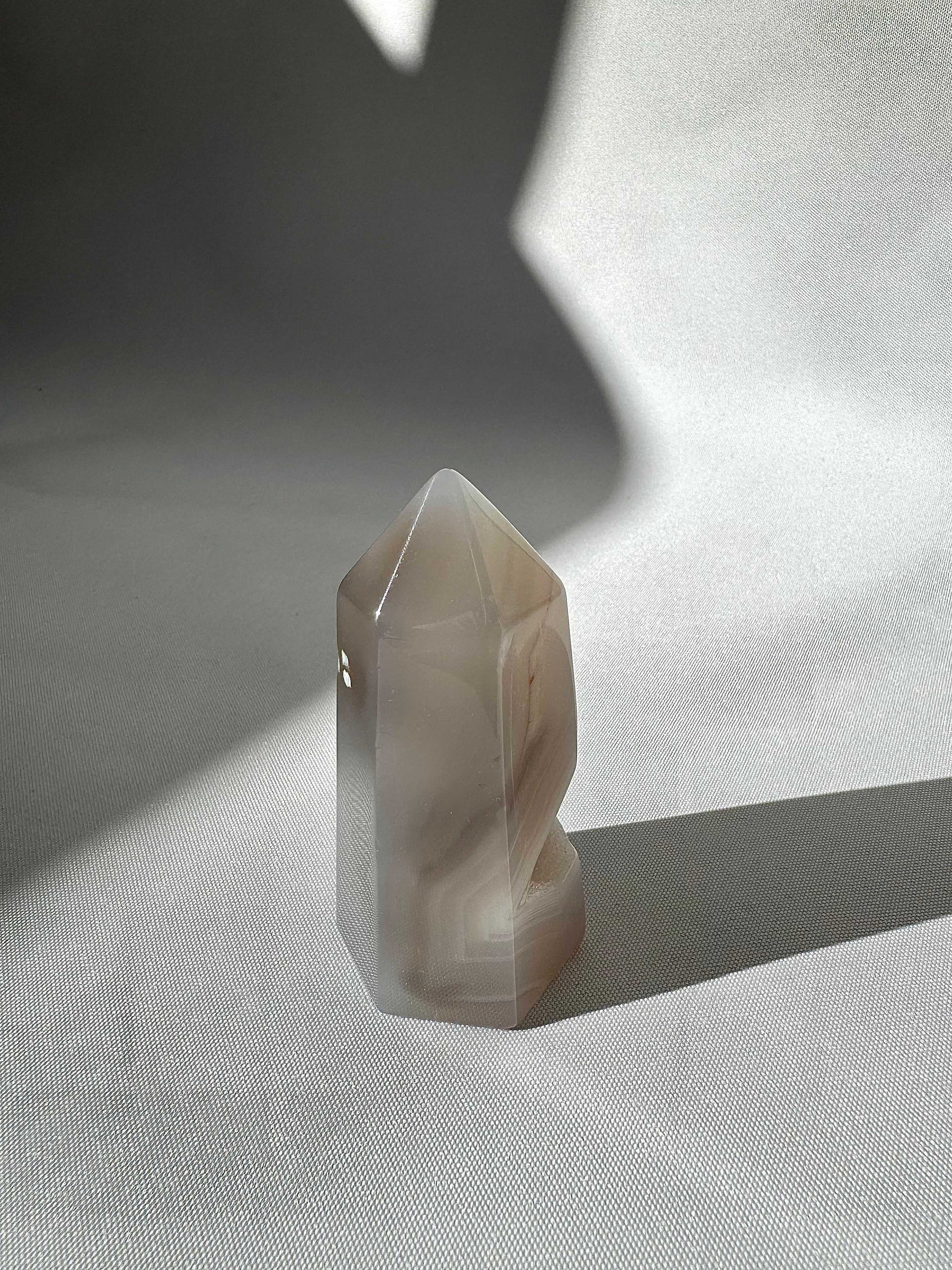Grey Agate Crystal Druze Point #5 with unique banding and smooth finish, perfect for crystal enthusiasts and home display from Bespoke Crystals.