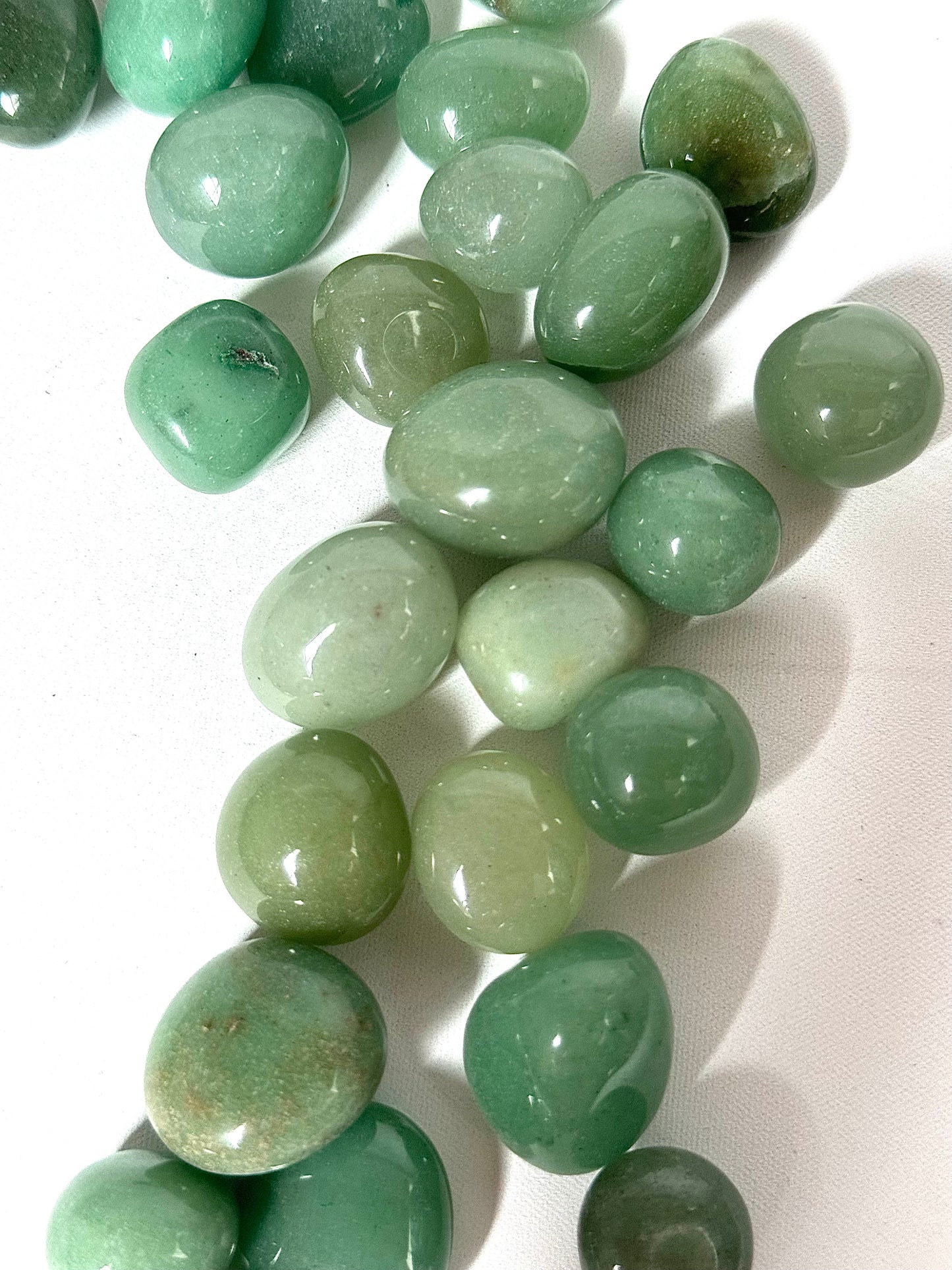 Top view of Green Aventurine Tumble Stones | Bespoke Crystals, perfect for DIY crystal decor, spiritual crafts, and abundance rituals.