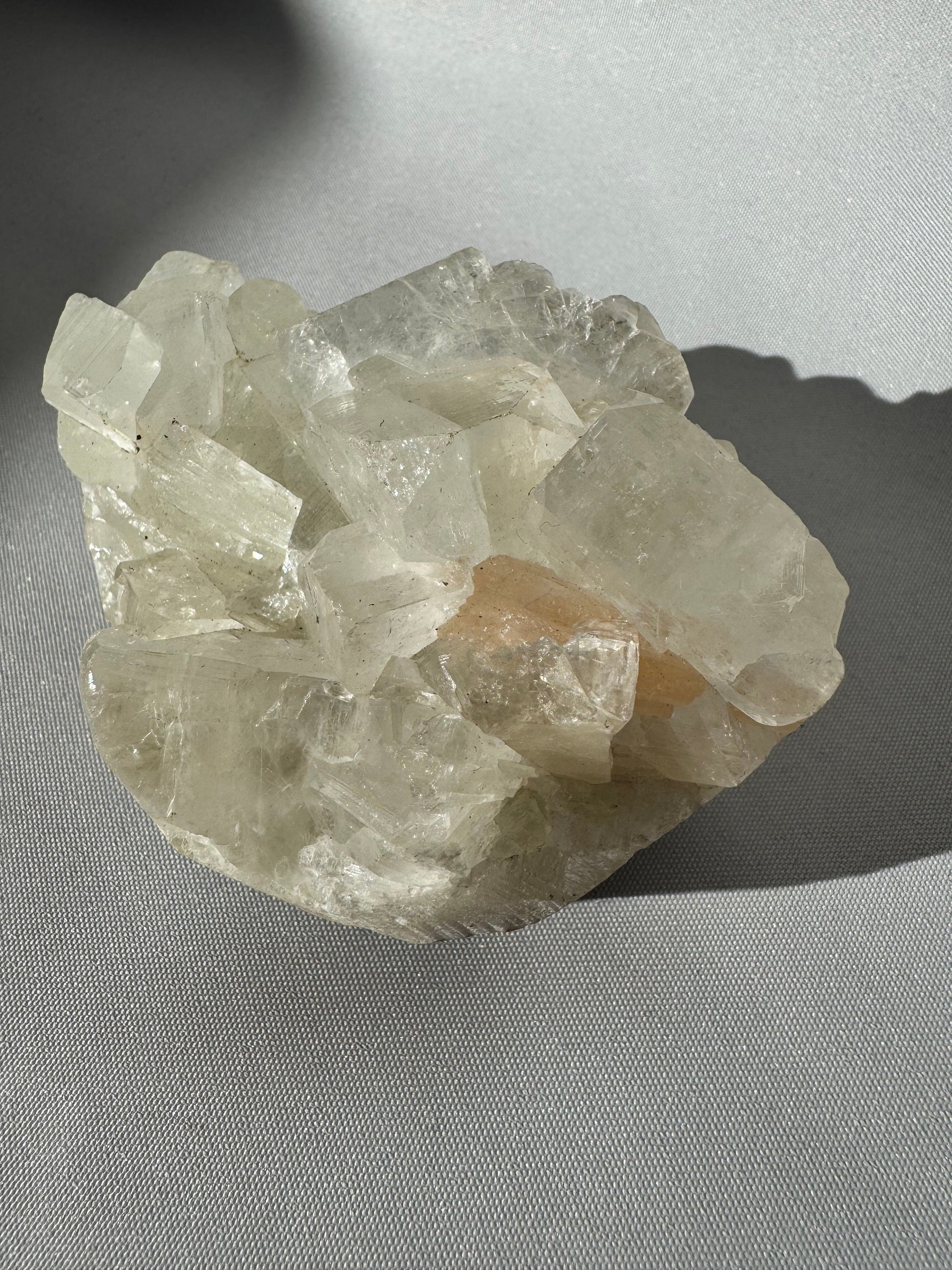 Apophyllite Crystal Cluster #1 featuring translucent pyramid-like formations with a natural shine, ideal for crystal collectors.