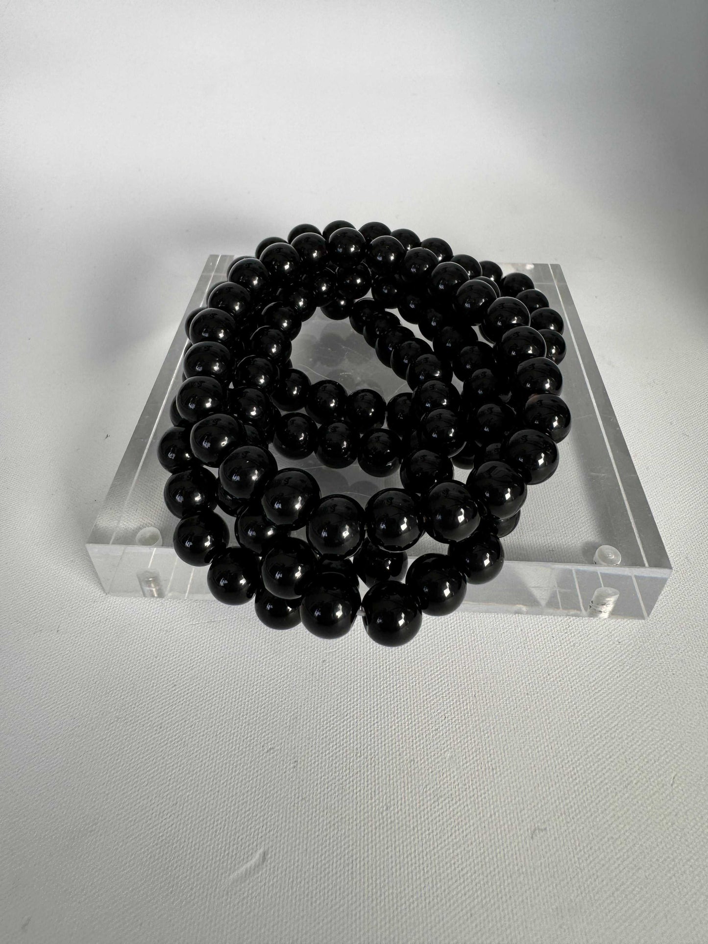 Black Obsidian Crystal Bracelet | Bespoke Crystals featuring polished volcanic glass beads