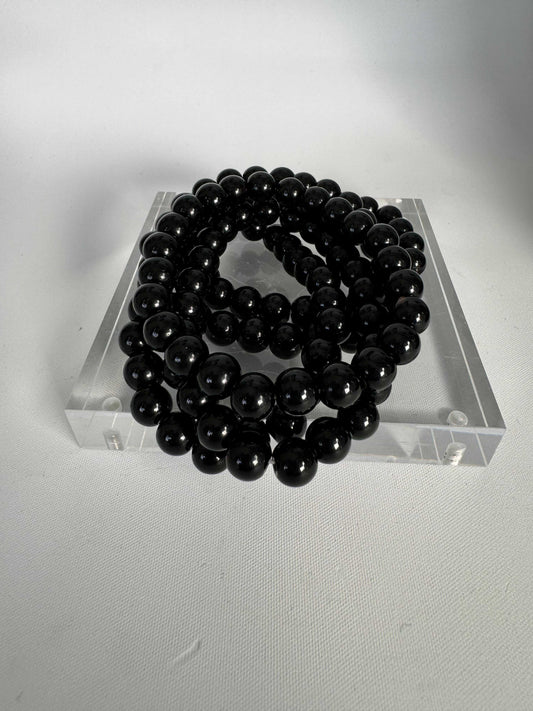 Black Obsidian Crystal Bracelet | Bespoke Crystals featuring polished volcanic glass beads