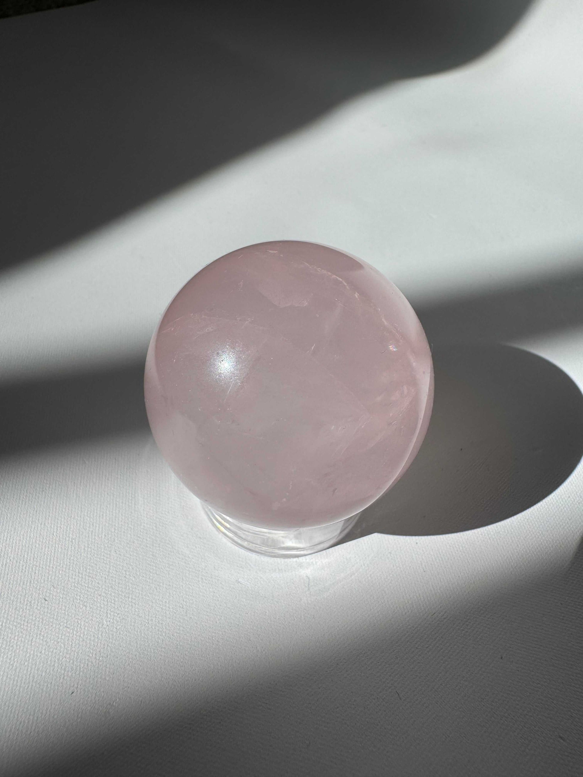 Polished Rose Quartz Crystal Star Sphere radiating calming energy | Bespoke Crystals