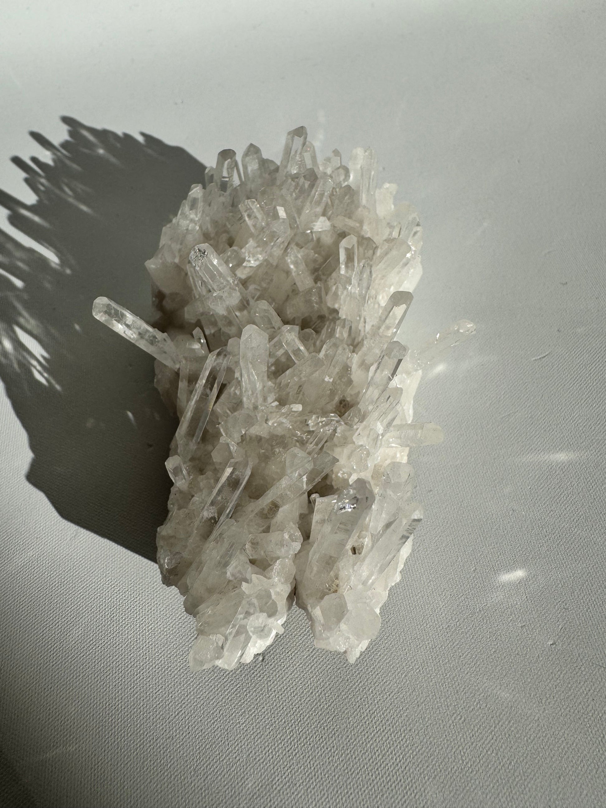 Top angle of Needle Quartz Crystal Cluster highlighting vertical crystal growth and natural clarity, suitable for hobbyists and mineral collectors.