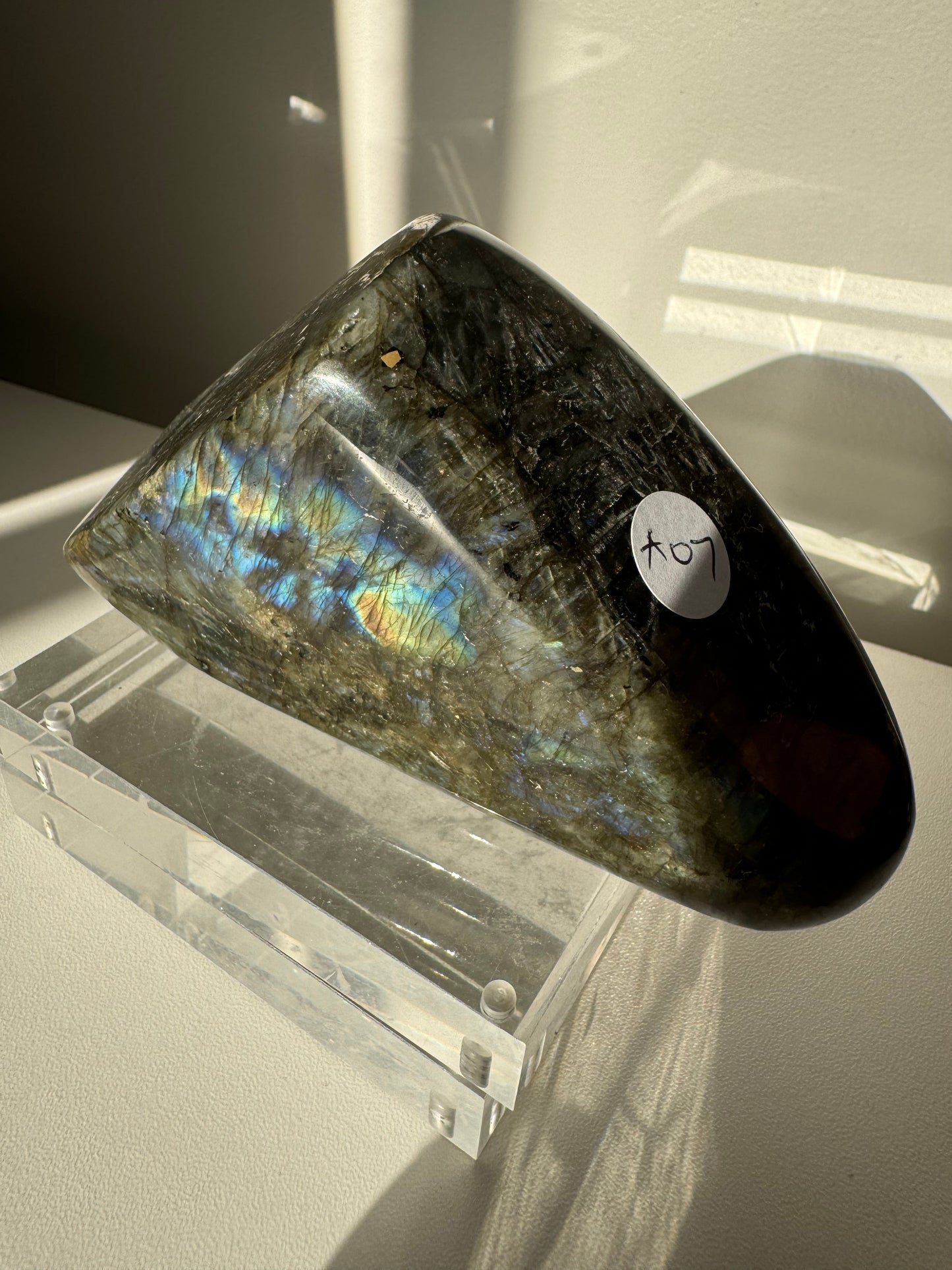 Side view of Labradorite Crystal Freeform #A07 showing deep blue flash and labeled 'A07', a unique collectible for crystal lovers in NZ.