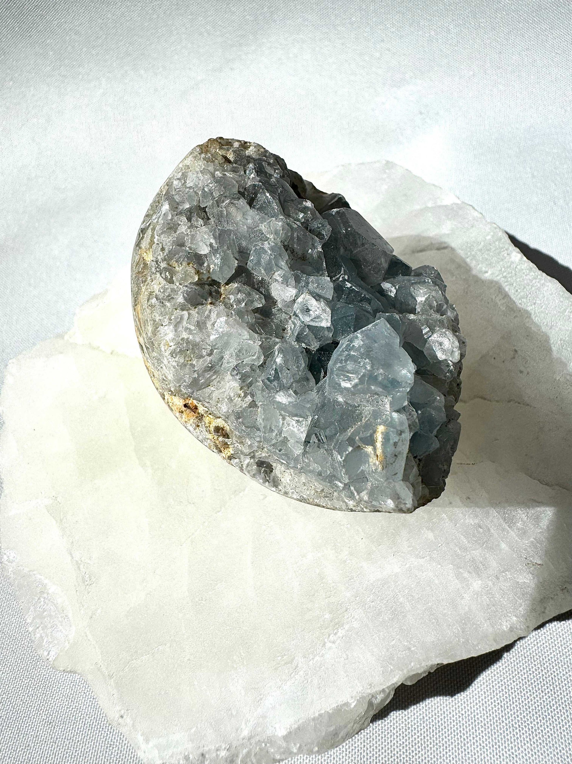 Celestite Crystal Druze Cluster #5 showcasing sparkling blue crystal formations, perfect for enhancing spiritual alignment and inner calm.