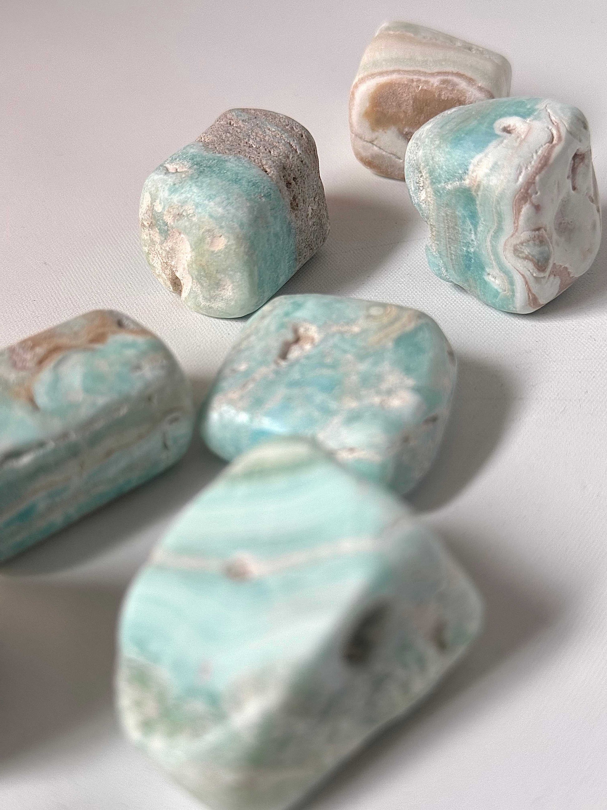 Large Blue Aragonite Tumble Stones with natural swirls, ideal for meditation and calming energy. Perfect for crystal collectors and spiritual use.