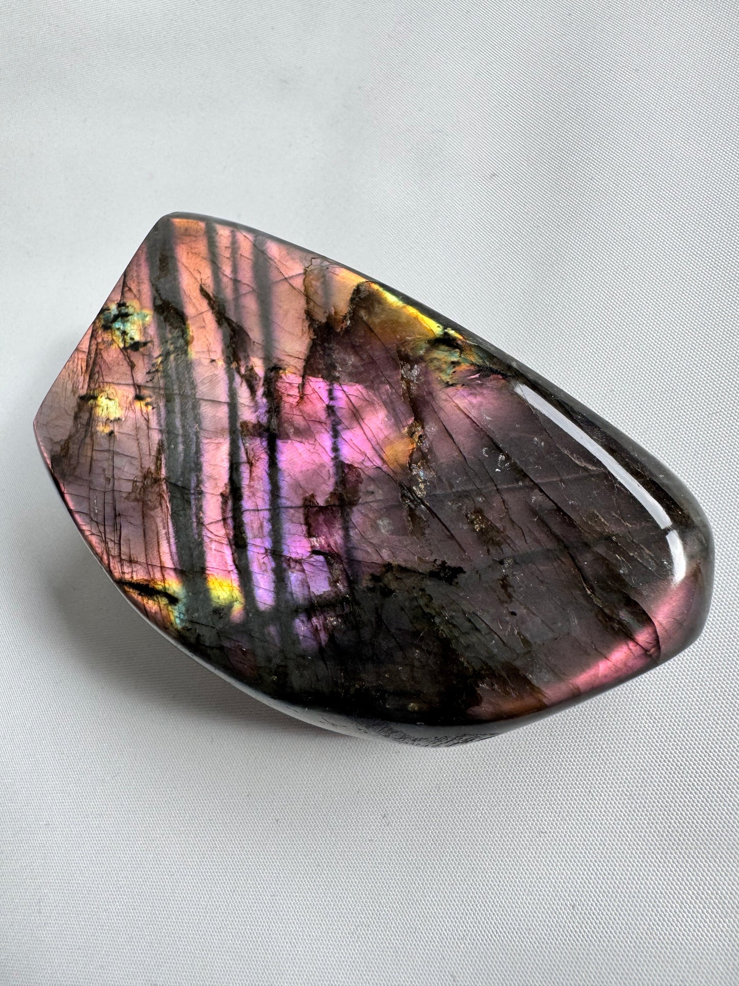 HQ Labradorite Freeform with vibrant iridescent flash in purples, golds, and pinks, ideal for collectors of crystals.