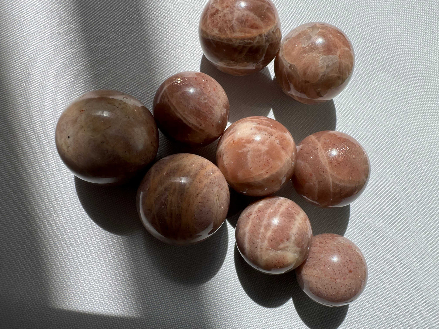 Peach Moonstone Crystal Mini Spheres | Bespoke Crystals NZ | Emotional balance and calming energy.