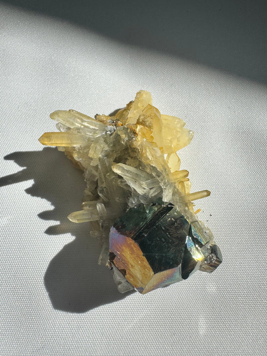 Iridescent Pyrite Crystal on Quartz #5 featuring rainbow-colored pyrite atop translucent quartz points, ideal for rare crystal collectors.