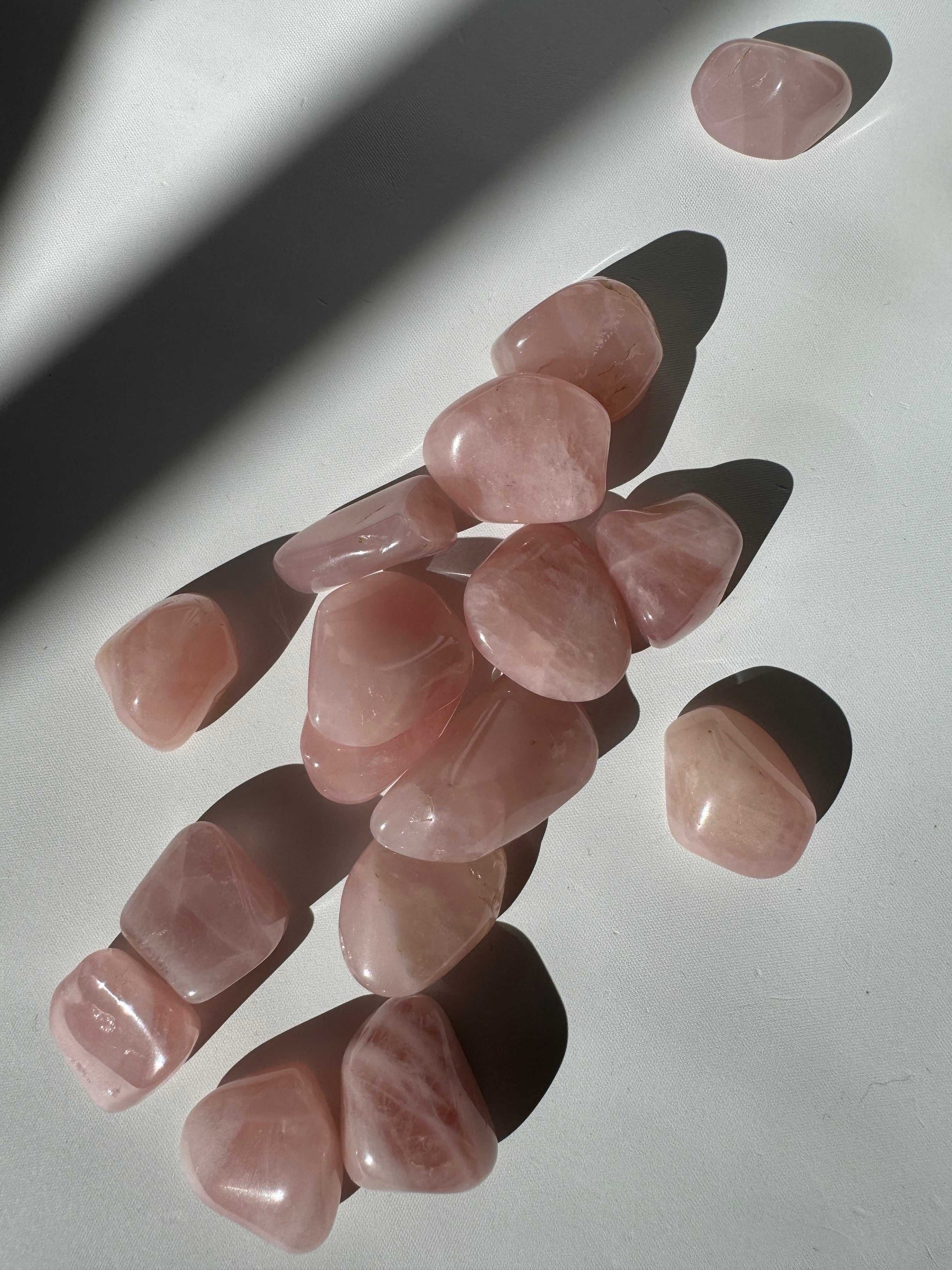 Polished Rose Quartz Tumble Stones by Bespoke Crystals , perfect for emotional healing and self-love practices.