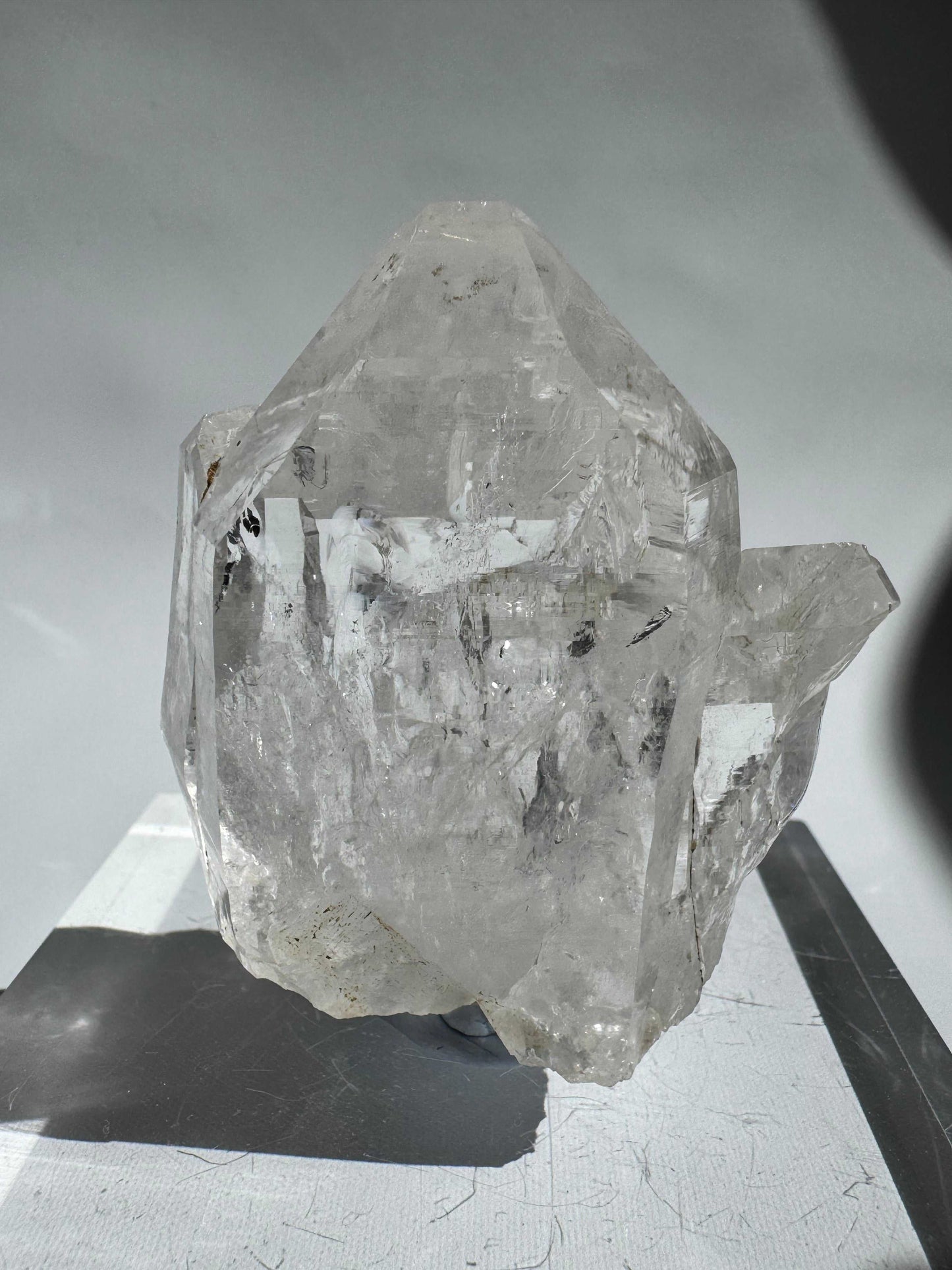 Front angle of Silver Light Lemurian Seed Crystal #5 highlighting its transparency and etched lines. Ethically sourced gemstone for higher consciousness.