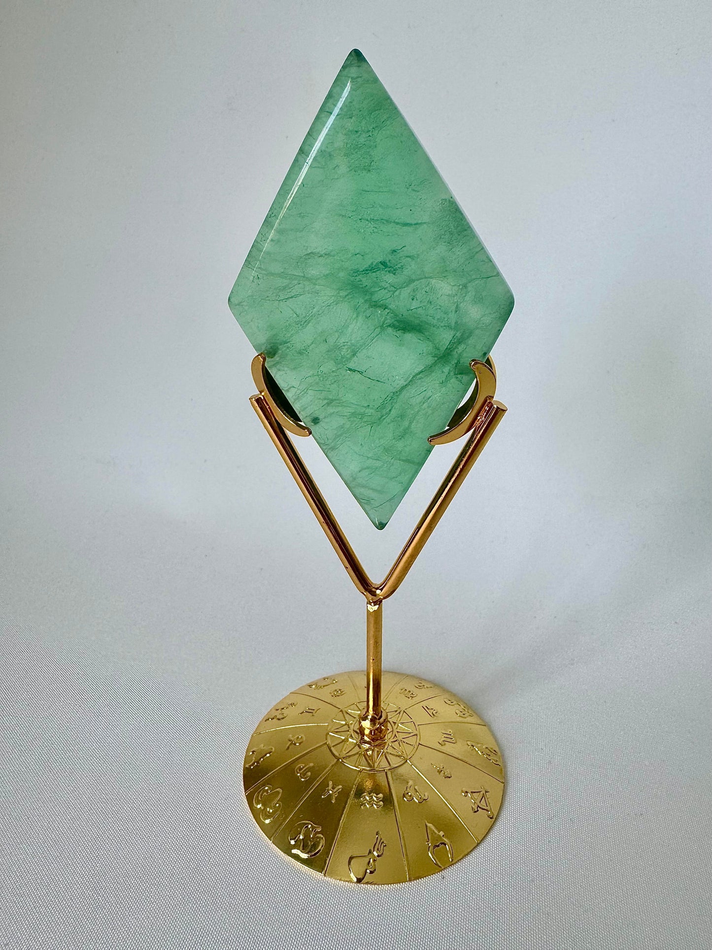 Green Fluorite Crystal Diamond on gold zodiac stand from Bespoke Crystals, ideal for collectors seeking peace and balance