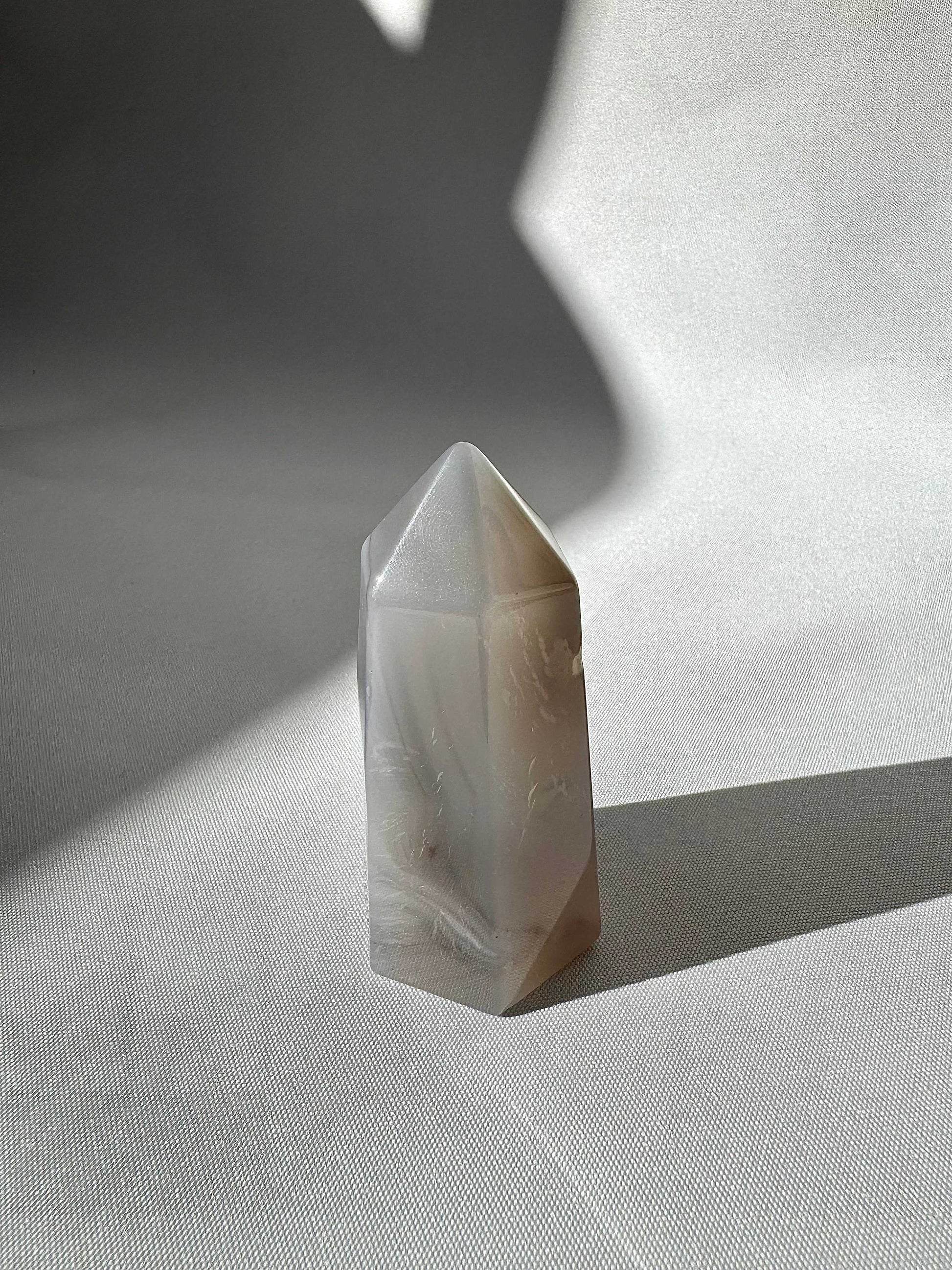 Bespoke Crystals' Agate Crystal Druze Point #5 showcasing intricate natural patterns and a sleek tower shape for crystalcollectors.