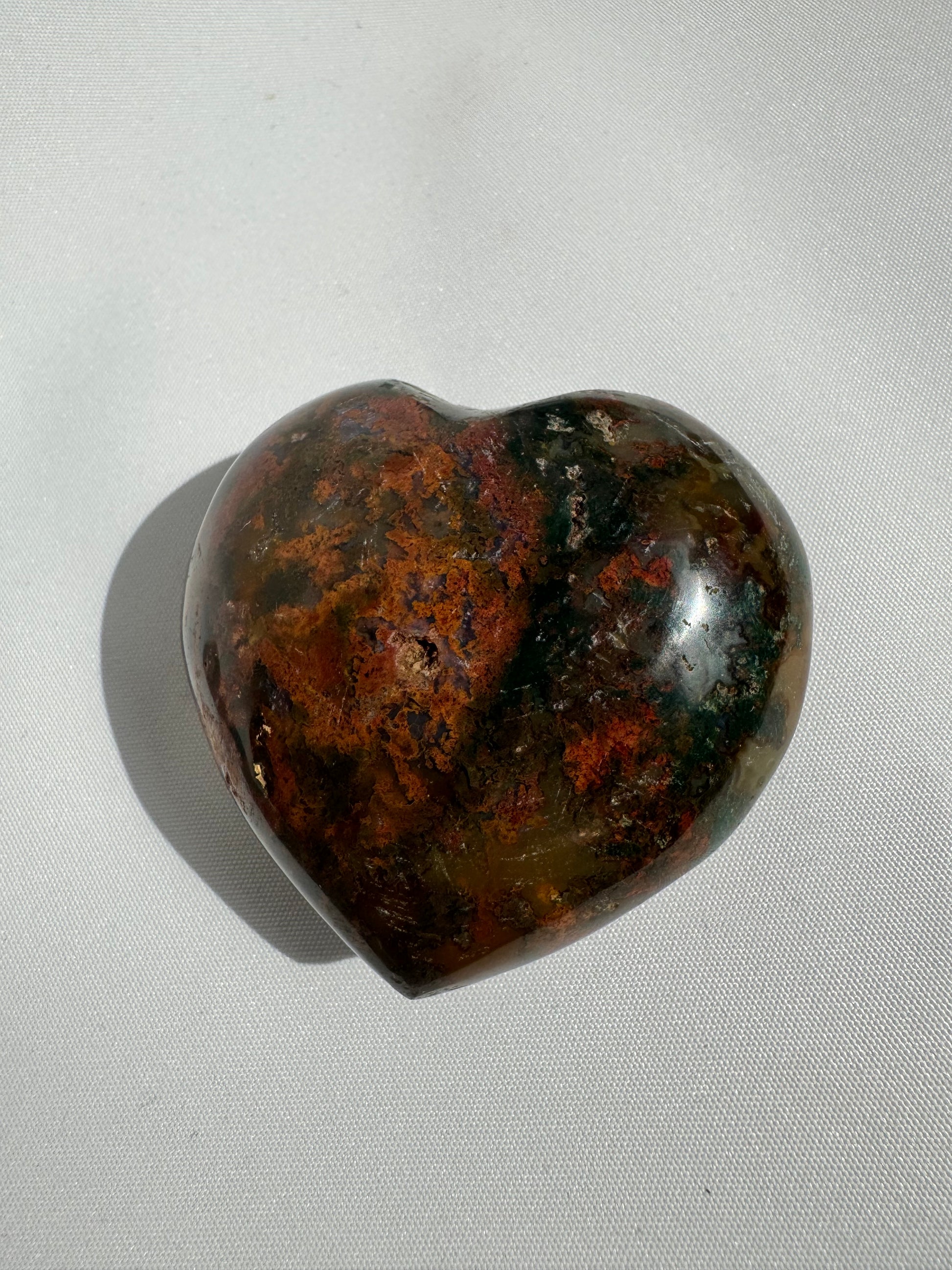 Polished Ocean Jasper Crystal Heart #1 featuring multicolored mineral patterns. A unique collectible from the Rocks & Fossils category.