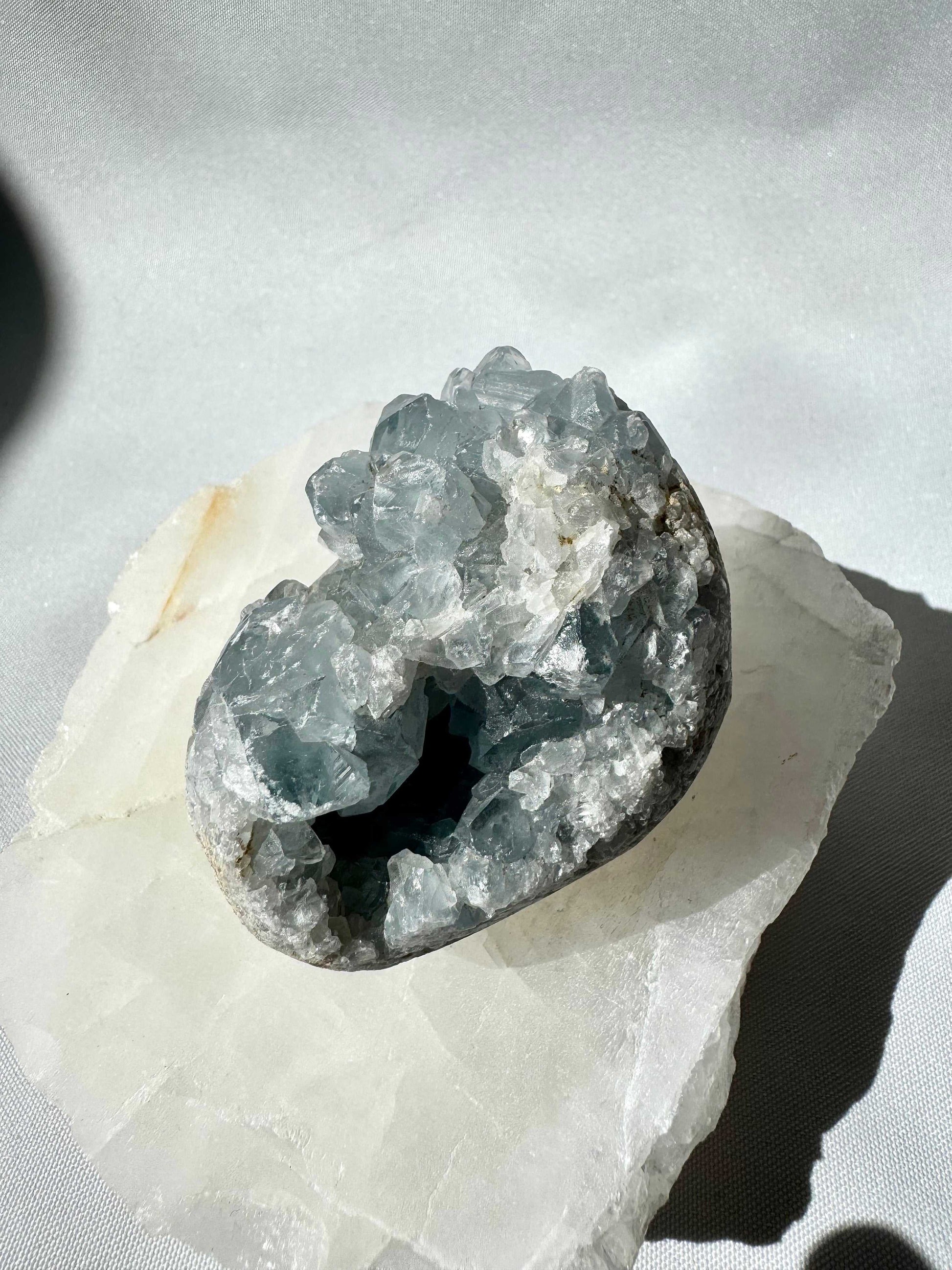 Celestite Cluster #4 featuring sky-blue crystal points in a natural druzy formation, ideal for peace and wisdom in crystal collections.