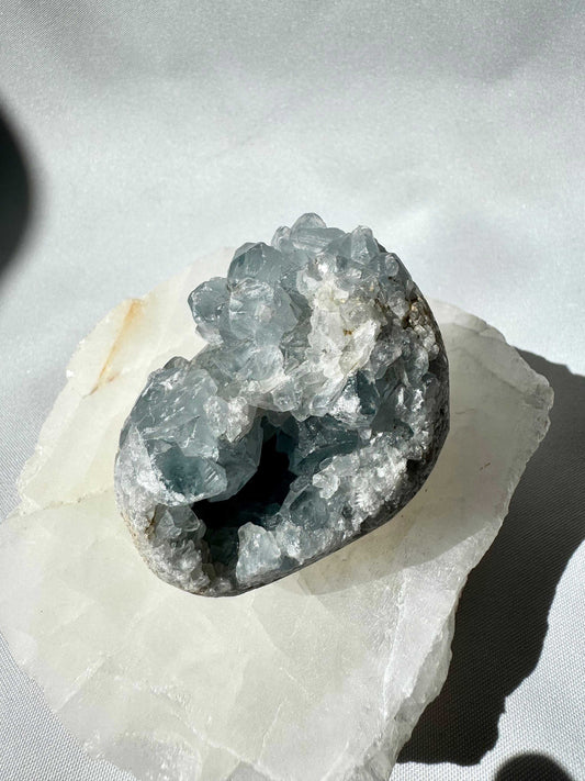 Celestite Cluster #4 featuring sky-blue crystal points in a natural druzy formation, ideal for peace and wisdom in crystal collections.