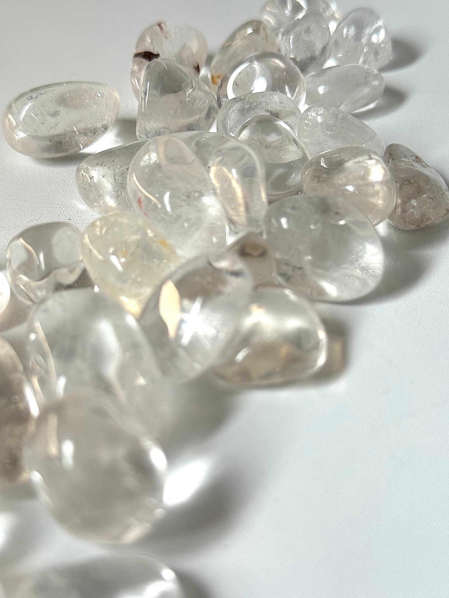 Brazilian Quartz Tumble Stones with natural clarity and smooth finish. Great for spiritual growth and energy work.