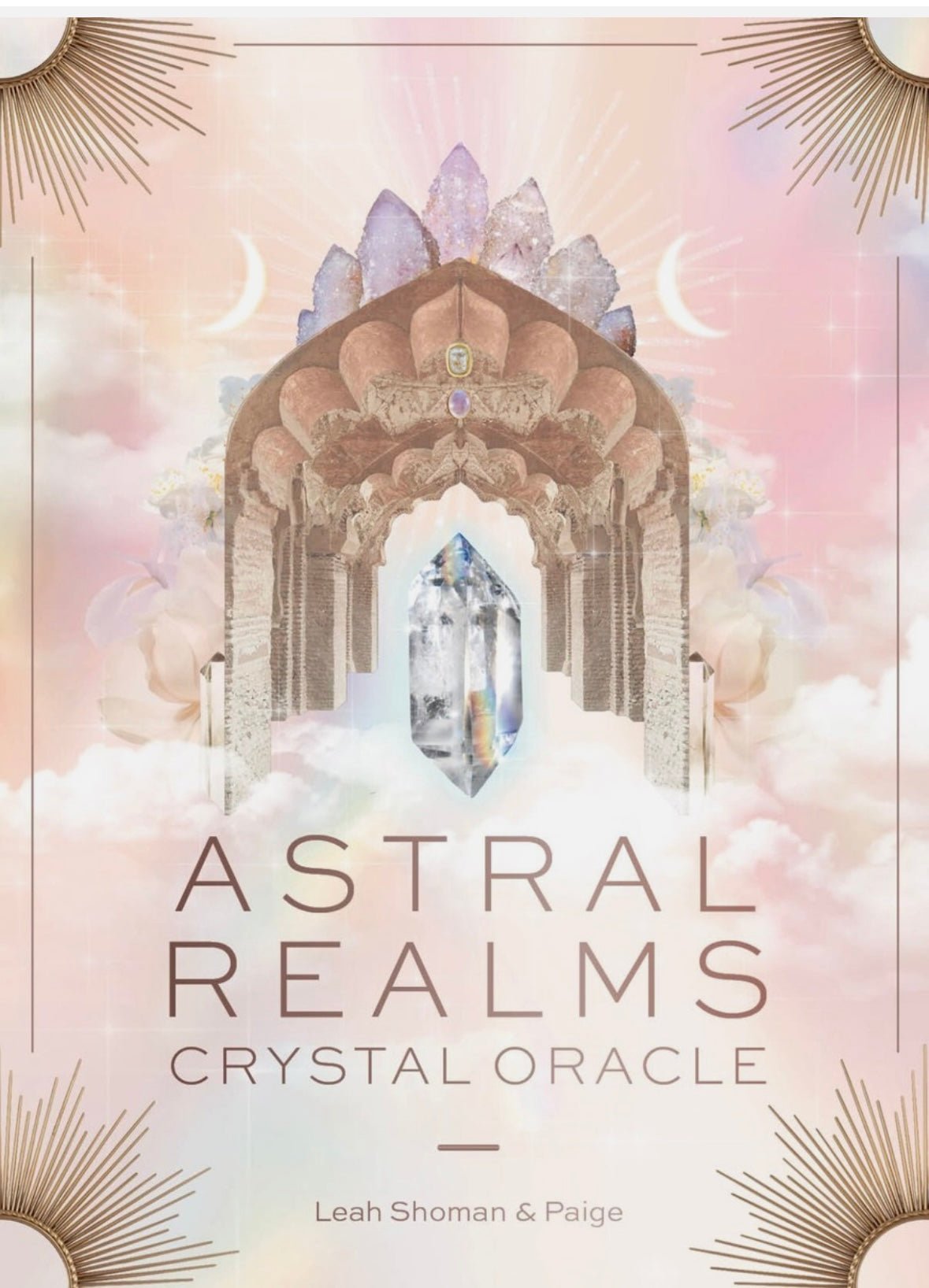 Cover of Astral Realms Crystal Oracle featuring a central clear quartz crystal, celestial arches, and pastel cosmic artwork for crystal healing.