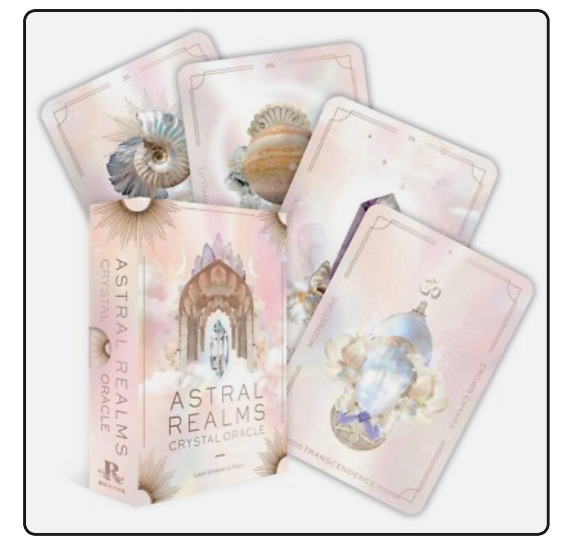 Astral Realms Crystal Oracle card deck with box and five illustrated oracle cards featuring crystals and celestial themes for spiritual guidance.