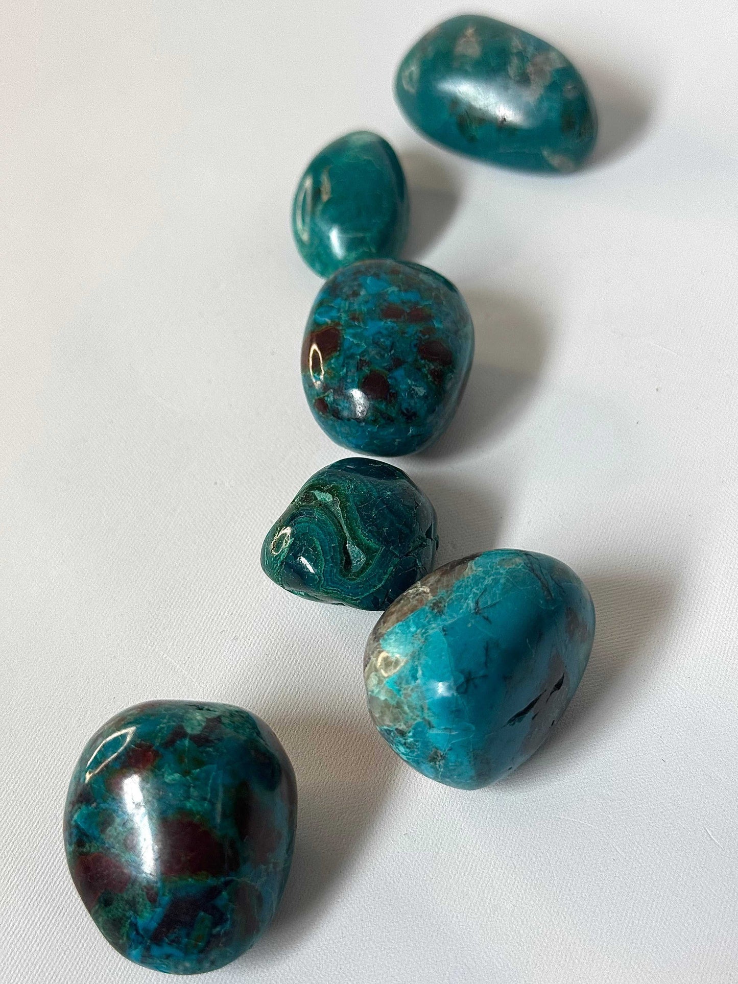 Chrysocolla Crystal Tumble Stone | Bespoke Crystals| polished finish and unique calming energy properties.