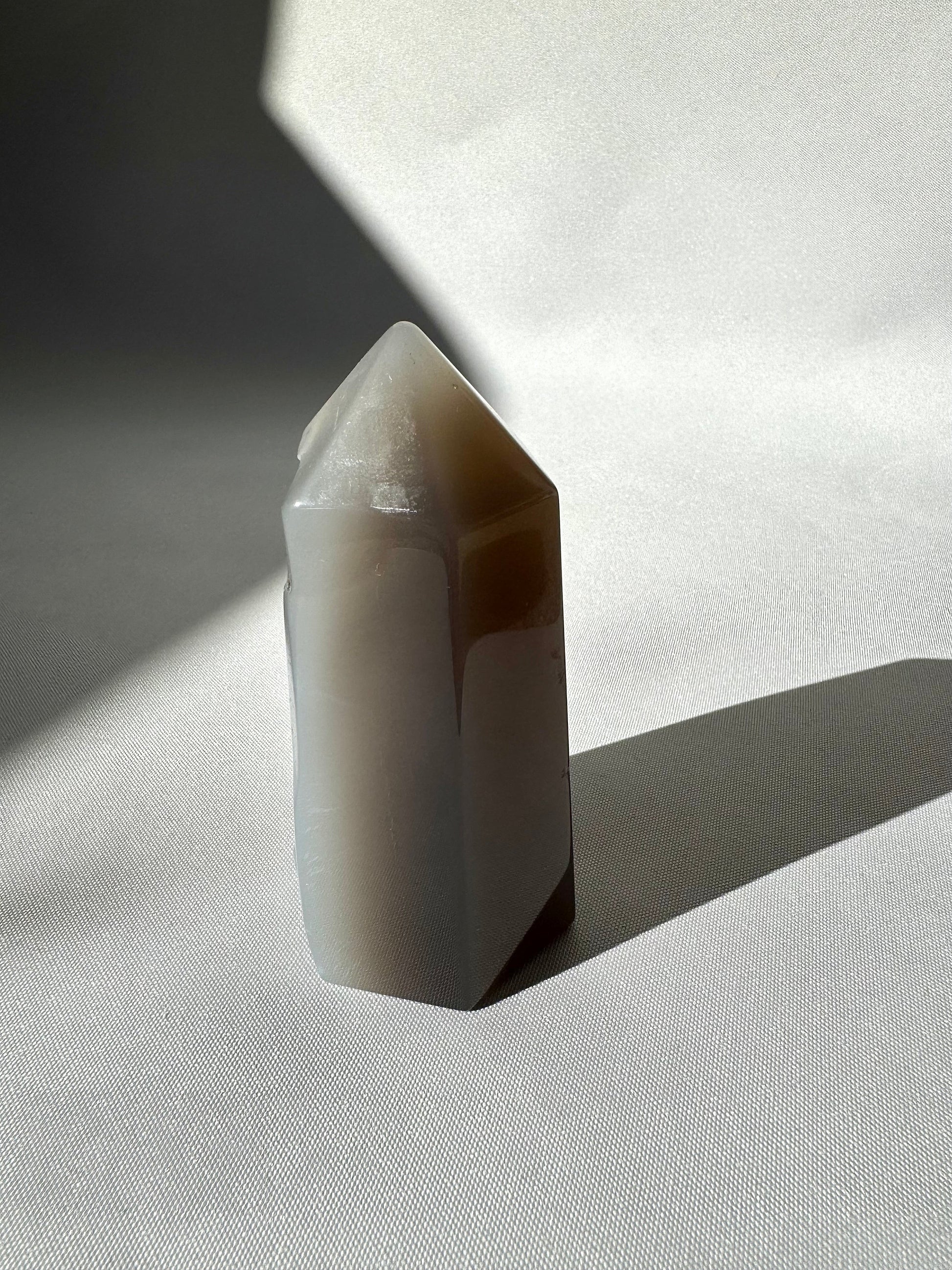Polished Grey Agate Crystal Druze Point #1 with smooth surface and pointed top, perfect for crystal collectors