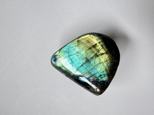 HQ Labradorite Freeform L25 Bespoke Crystals showcasing vibrant peacock blue and golden iridescence on polished surface, ideal for collectors.