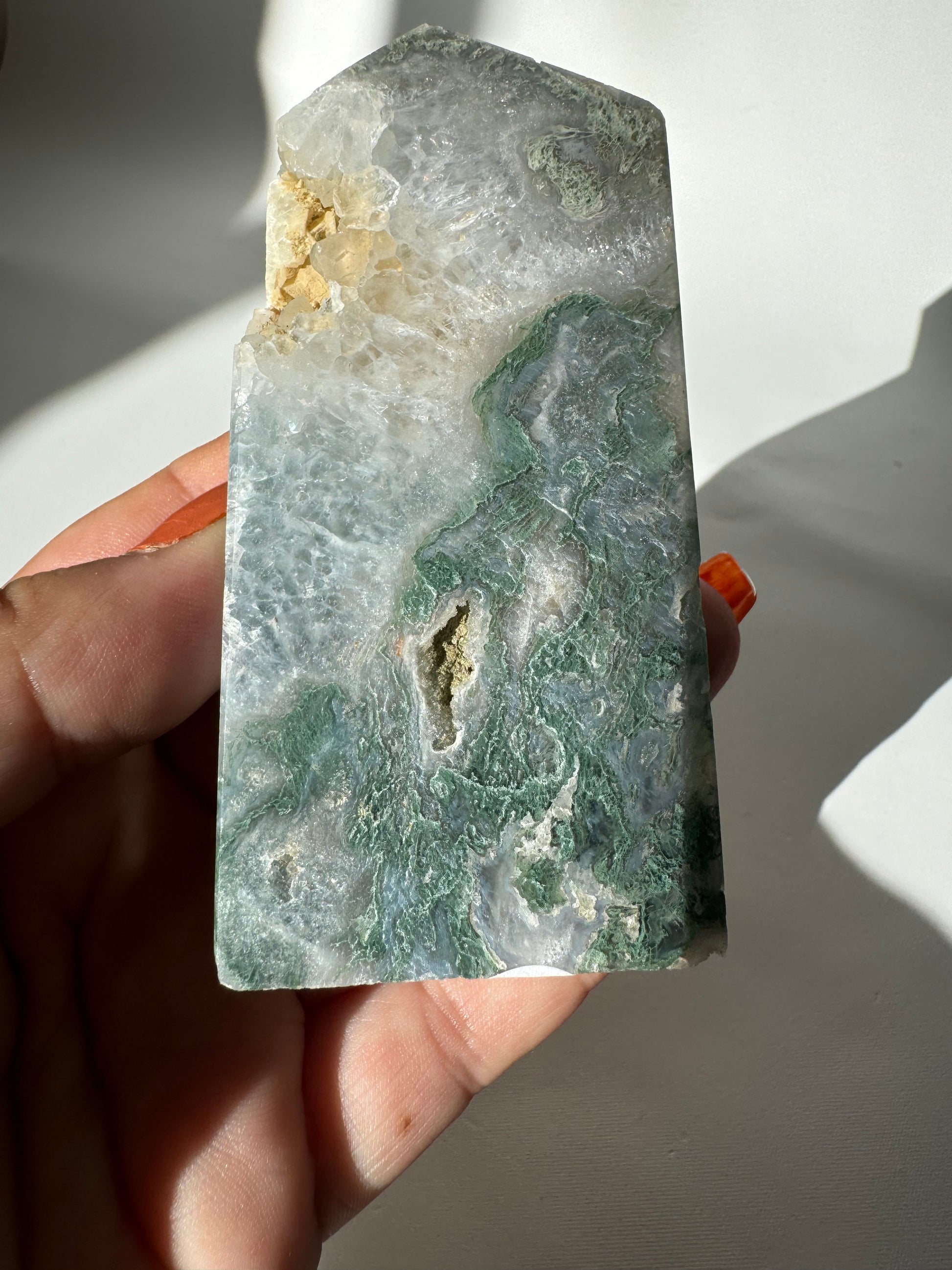 Back view of Moss Agate Crystal Druze Tower #3 showcasing natural green swirls and translucent quartz textures for collectible crystal displays.