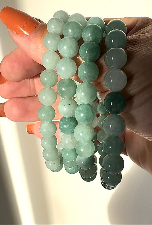 Green Aventurine Crystal Bracelet | Bespoke Crystals featuring polished round beads in varying green hues, ideal for manifestation and protection.