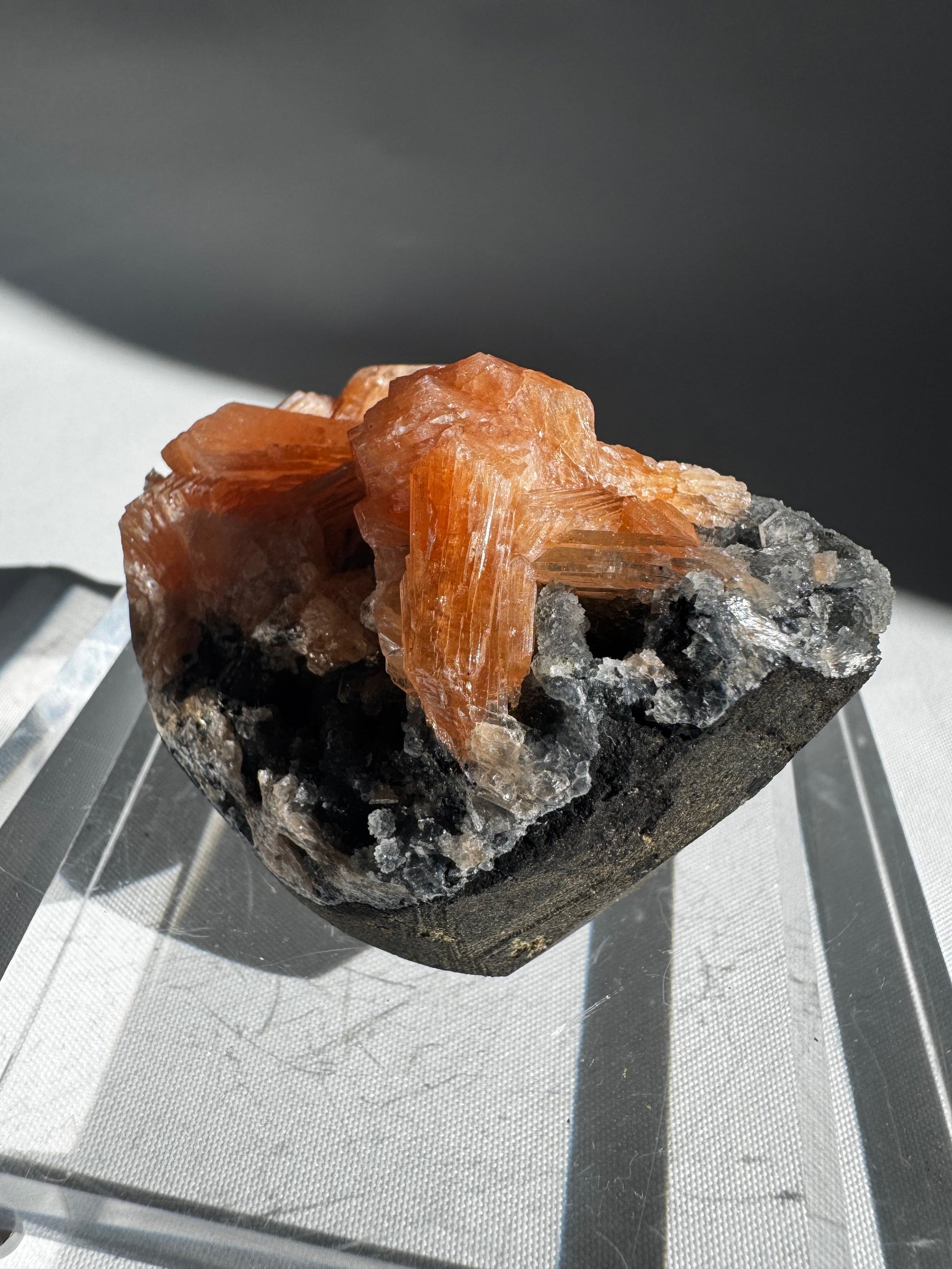 Rare Blue Chalcedony with Stilbite Crystal #3 from Nasik mines, showcasing vibrant orange crystal formations on a dark mineral base.