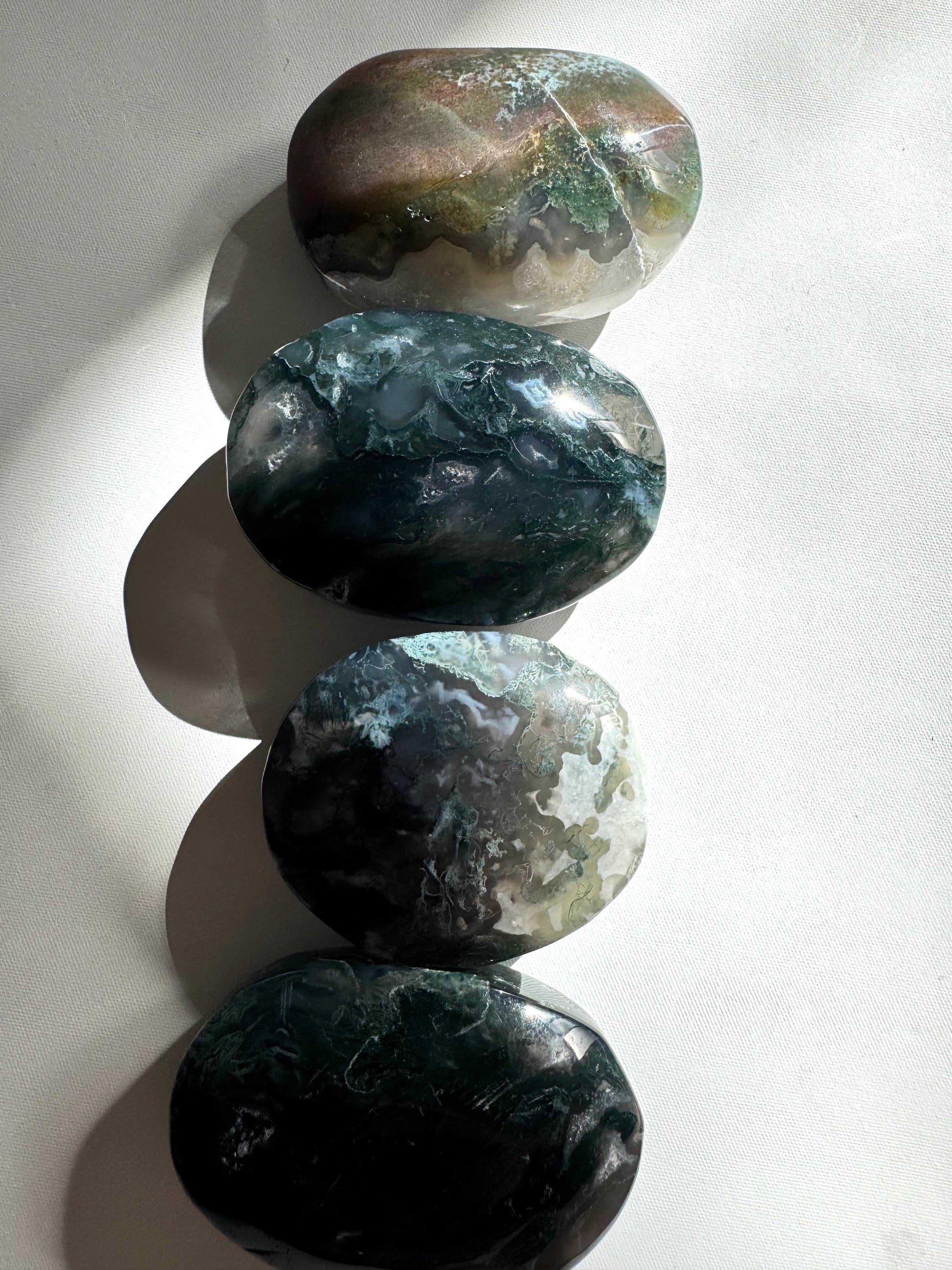 Moss Agate Crystal Palm Stones with unique green and earthy patterns | Bespoke Crystals