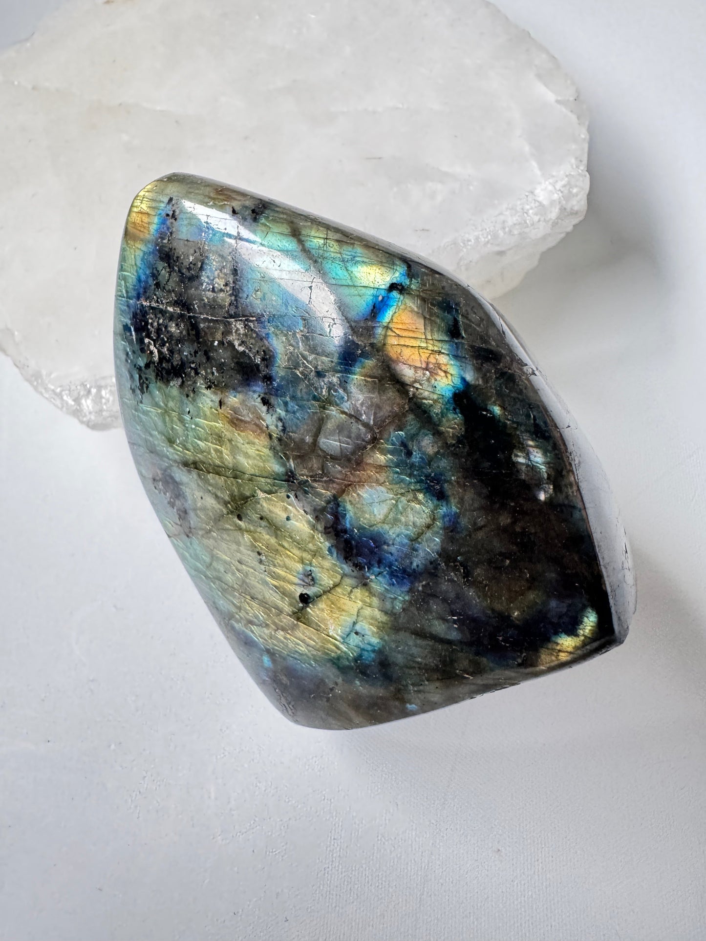 Labradorite Freeform #A09 Bespoke Crystals showing aurora-like flashes, a unique collectible for crystal lovers and spiritual decor.
