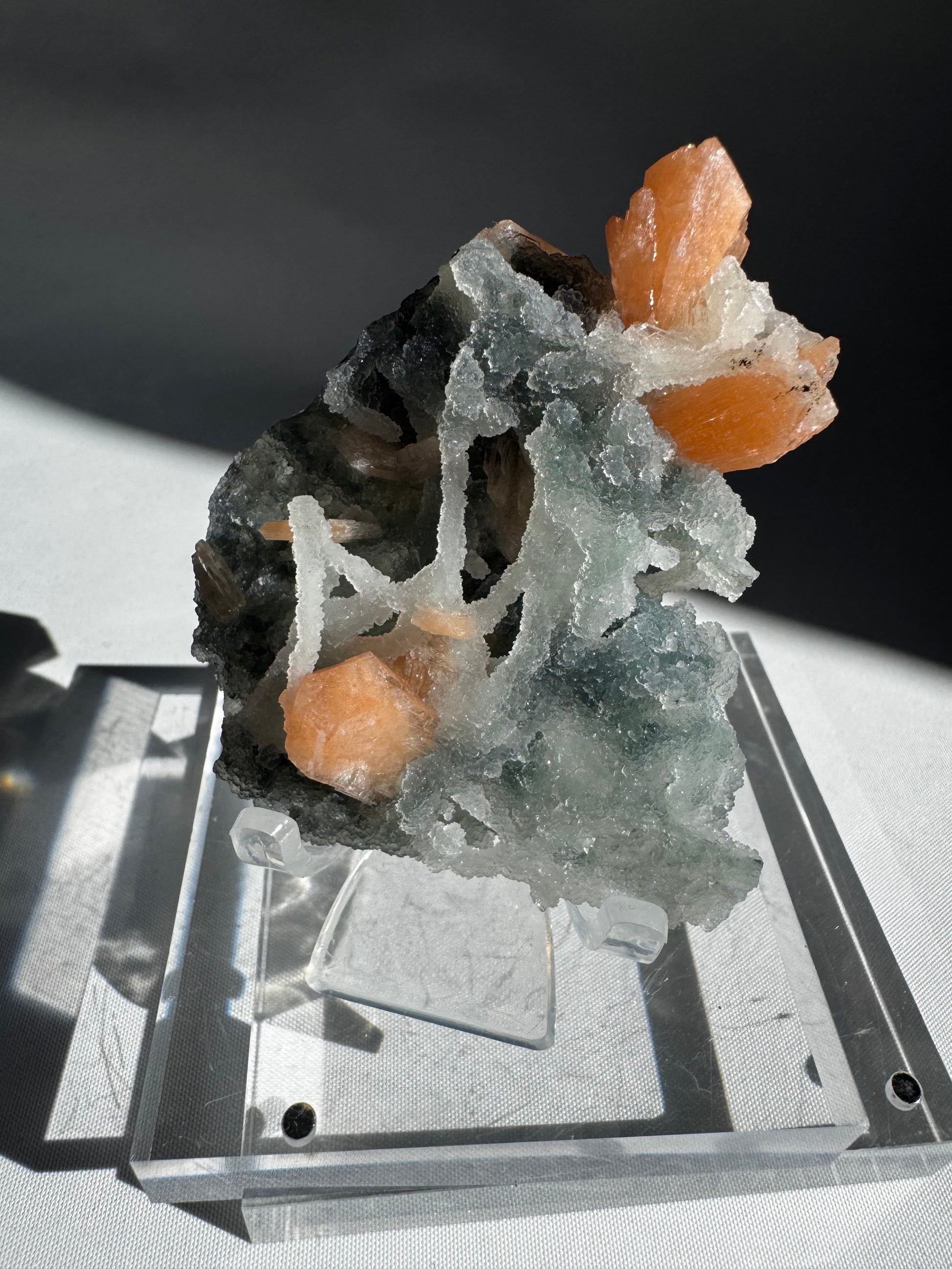Chalcedony with Orange Stilbite Crystal #4 with multiple orange Stilbite points on a shimmering Chalcedony matrix, sourced from Maharashtra’s Nasik mines.