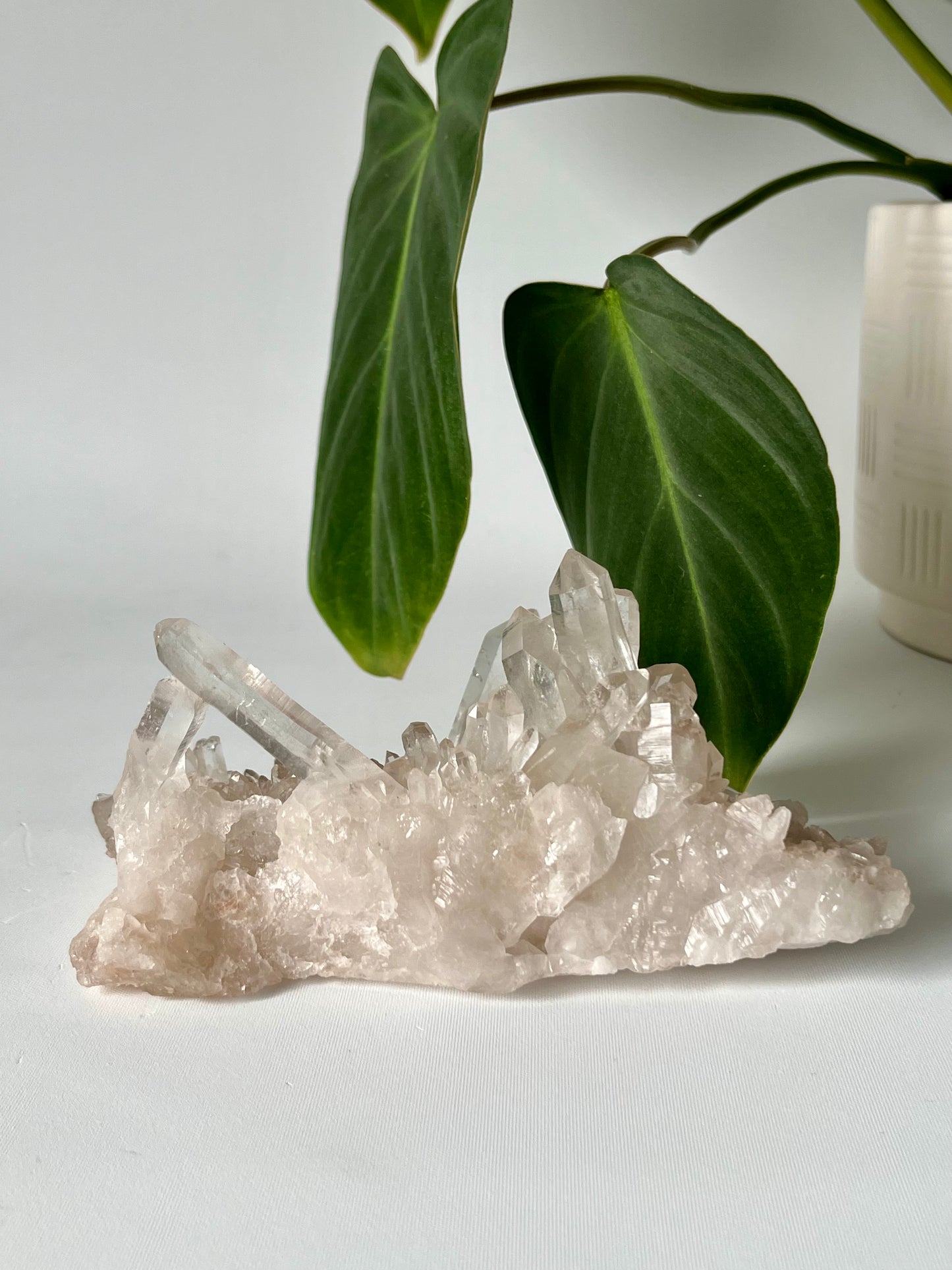 Side view of Himalayan Samadhi Quartz Crystal Cluster showcasing natural pink quartz formations, perfect for collectors and spiritual decor.