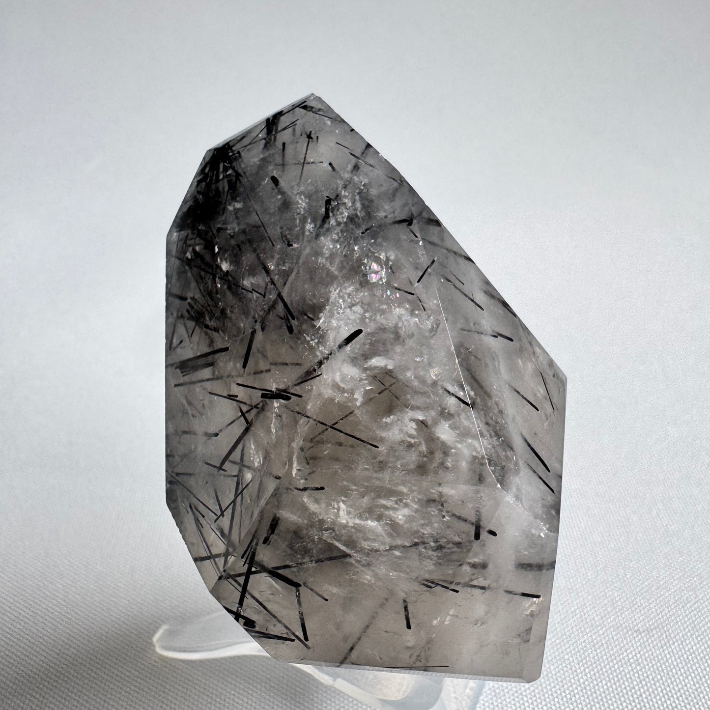 Polished Black Tourmalinated Quartz Freeform #6 showcasing needle-like rutile strands, perfect collectible for energy amplification and grounding.