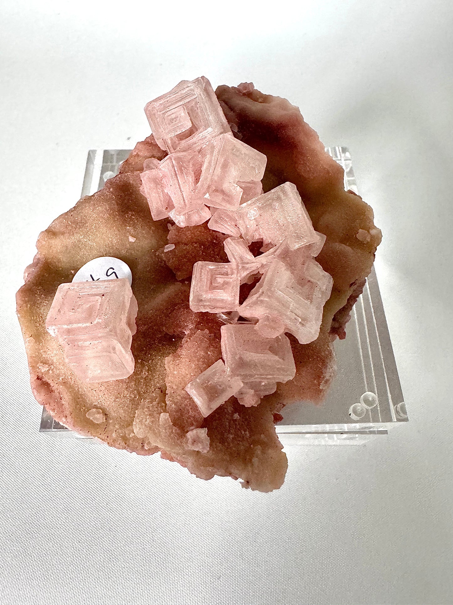 Rare Pink Halite Crystal #9 with geometric cube structures on a mineral base, perfect for bespoke crystal collections and metaphysical use.