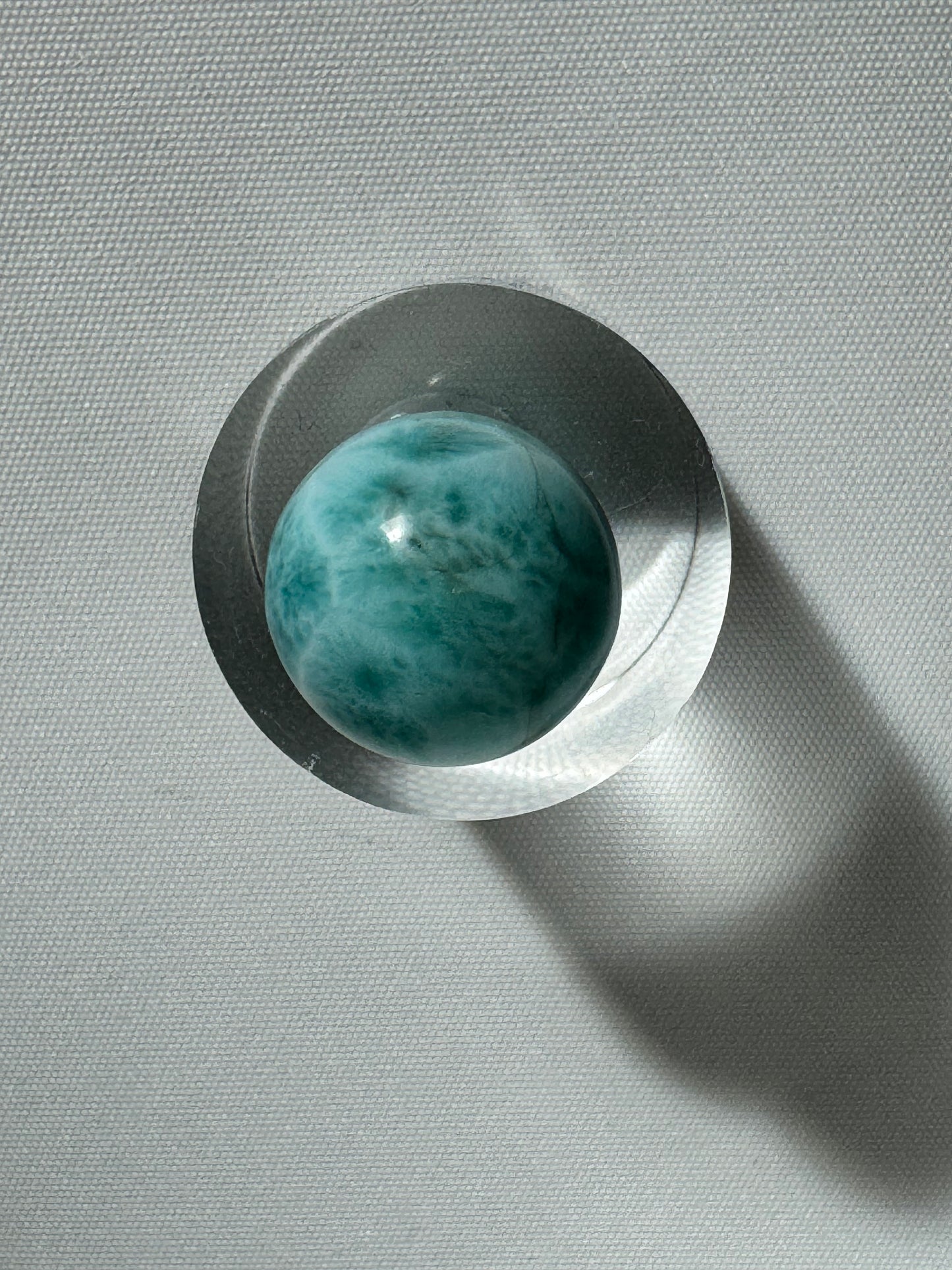 Larimar gemstone sphere from above view | Bespoke Crystals NZ