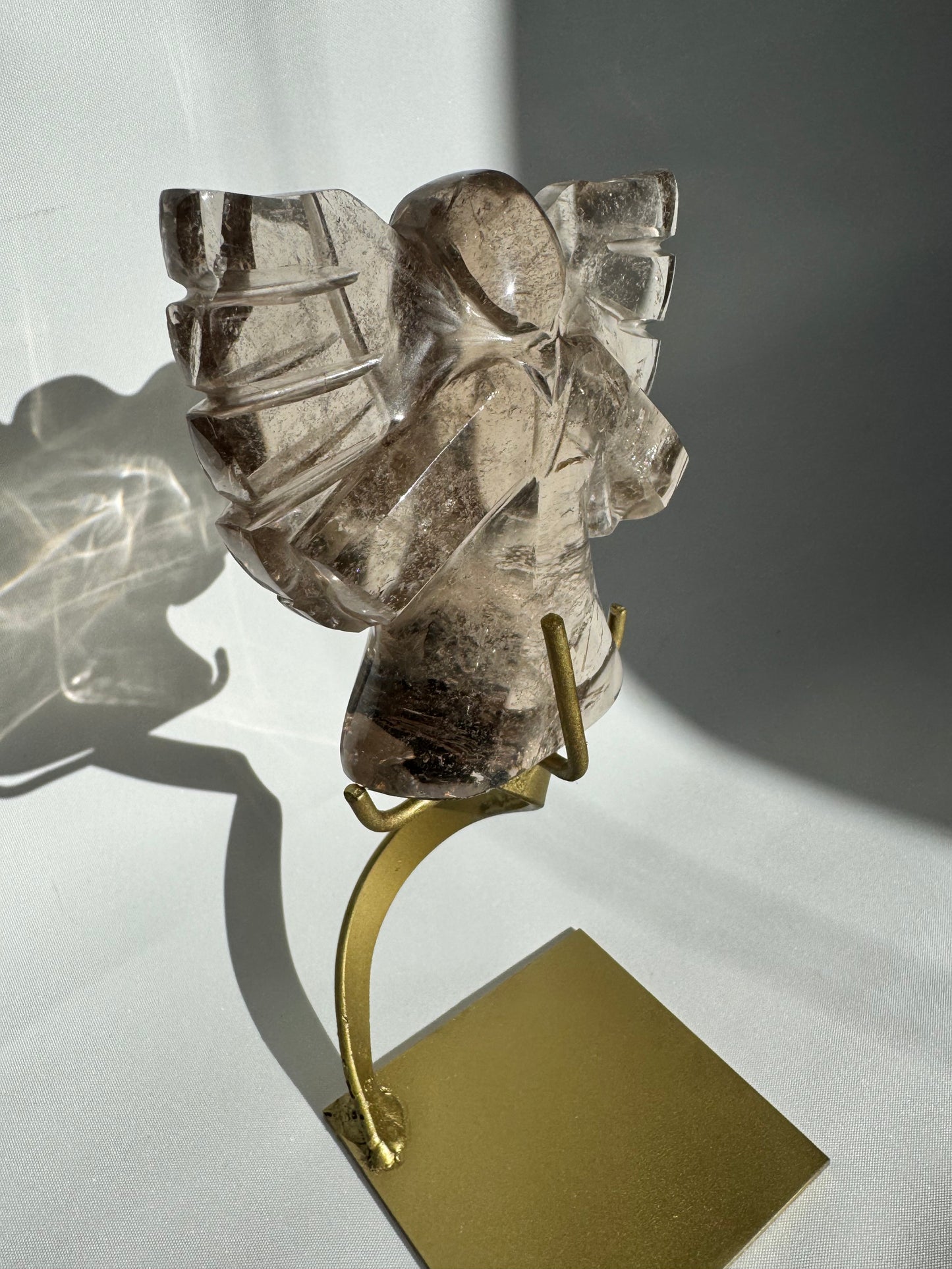 Side view of Smoky Quartz crystal angel sculpture with gold stand | Healing Crystals NZ