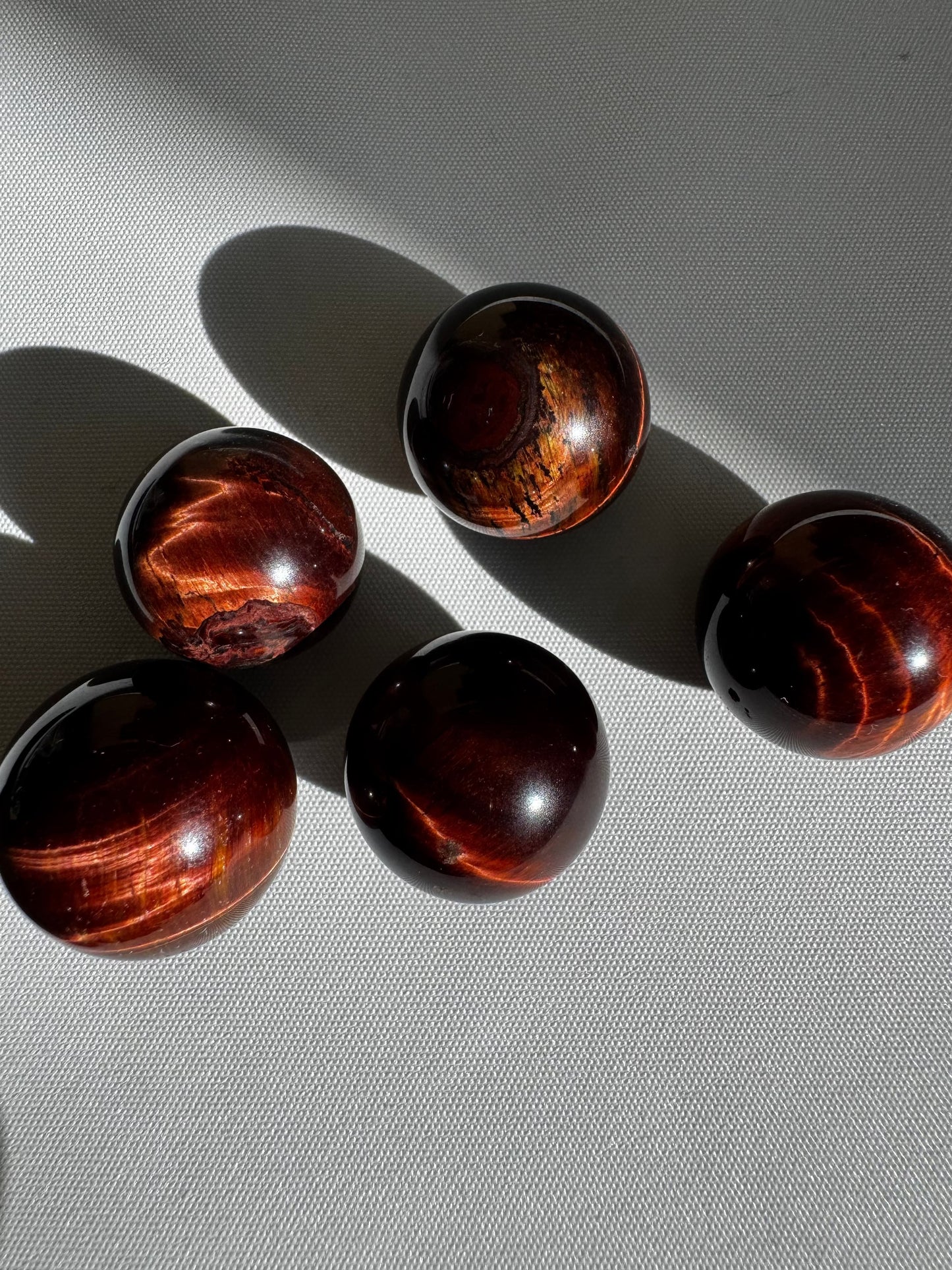 Red Tigers Eye Crystal Mini Sphere with deep fiery hues and silky luster, ideal for collectors of rocks and crystals