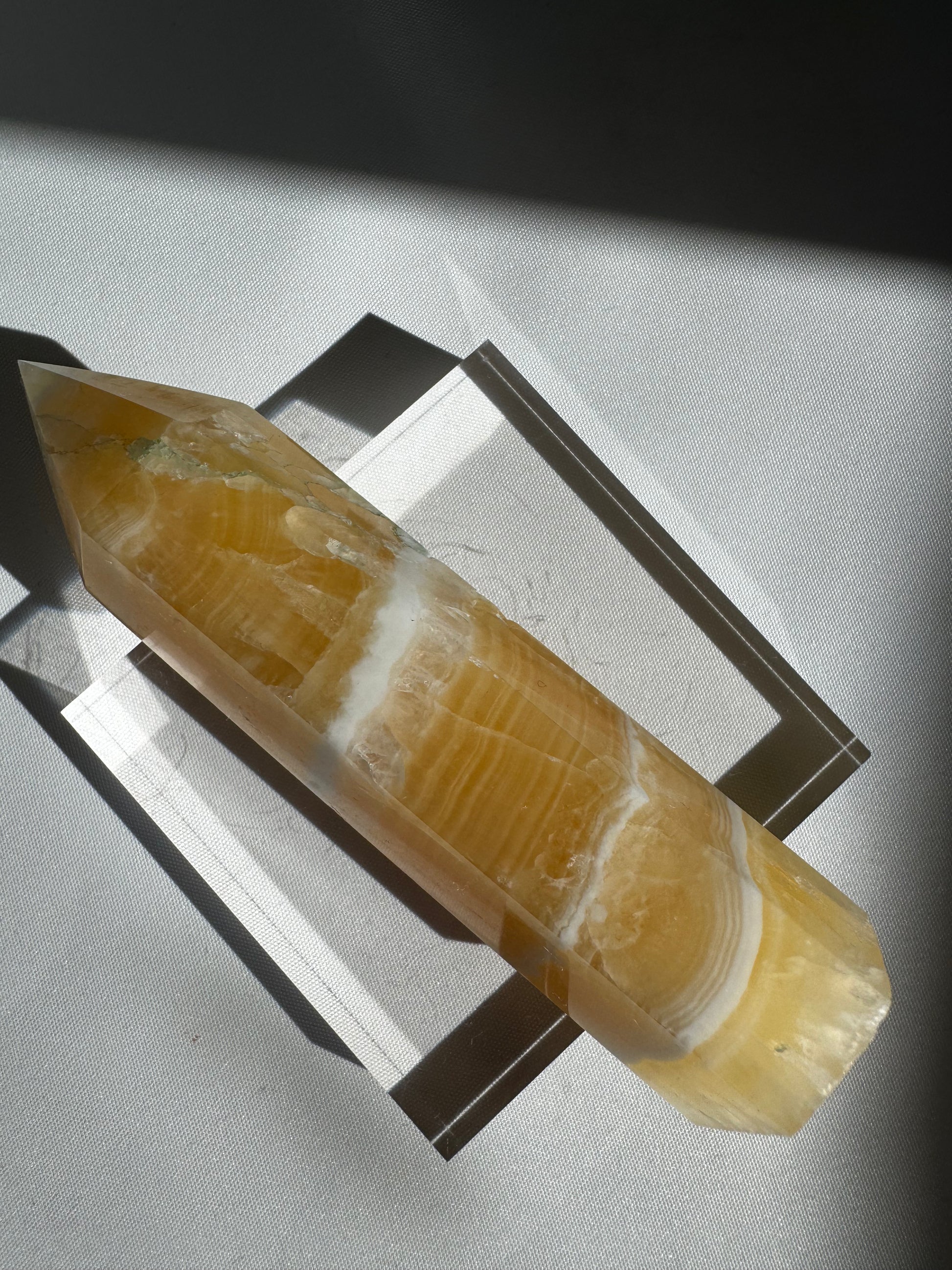 Horizontal view of Orange Calcite Crystal Tower | Bespoke Crystals