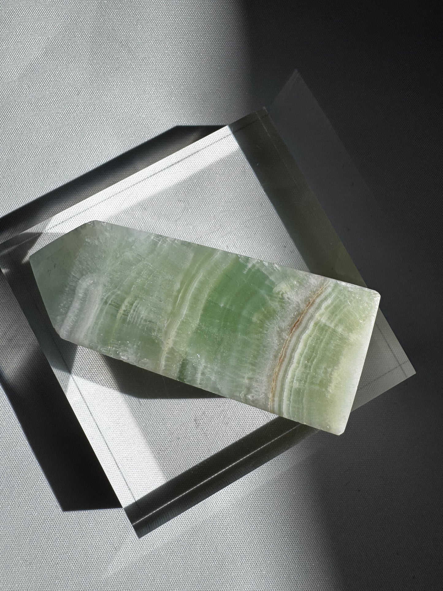 Horizontal view of Pistachio Calcite Mini Tower #6 | Bespoke Crystals