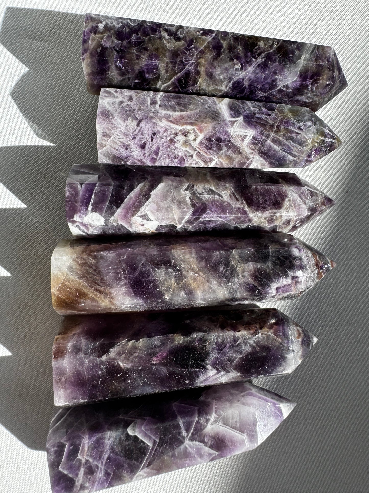 Chevron Amethyst Crystal Generator Points featuring unique purple and milky quartz patterns | Bespoke Crystals