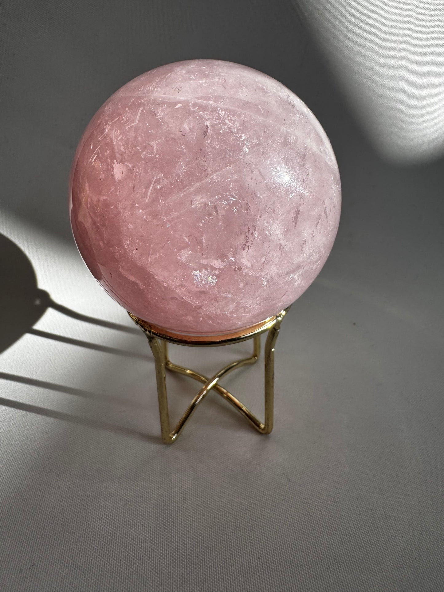 Rose Quartz Sphere on gold stand | Buy Rose Quartz Sphere online in NZ for love, peace, and elegant decor | Bespoke Crystals NZ