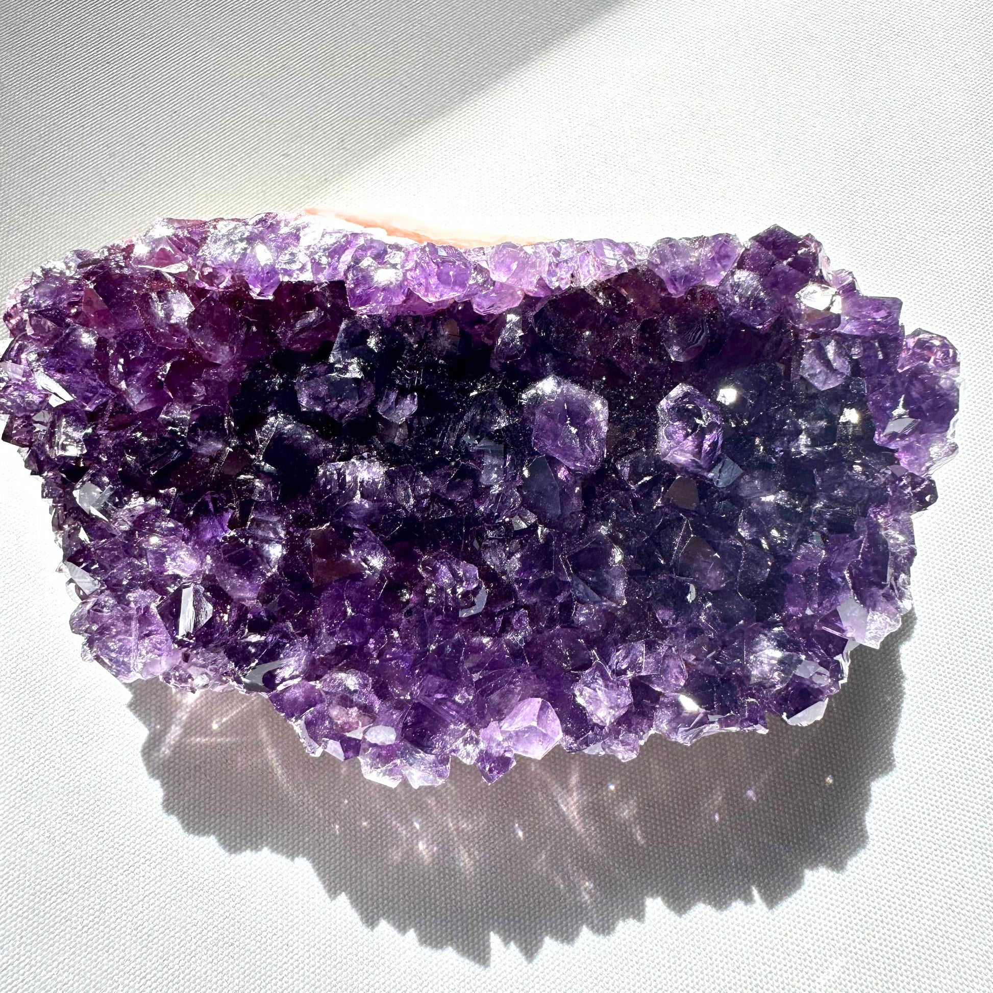 Top grade Uruguayan Amethyst Crystal showcasing vibrant violet tones and natural geode formation |Bespoke Crystals