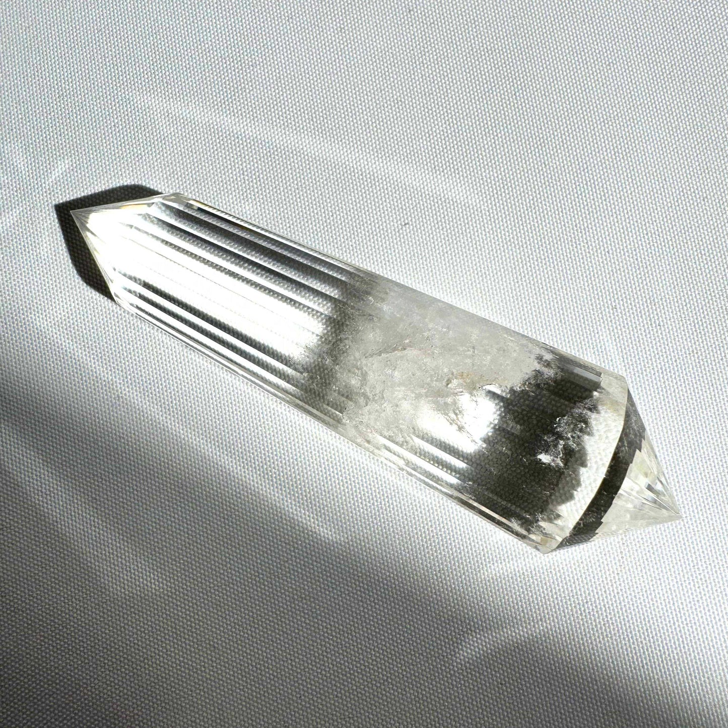 Clear Quartz 24-Sided Vogel Healing Crystal with precision-cut facets, ideal for energy work, chakra balancing, and spiritual healing rituals.