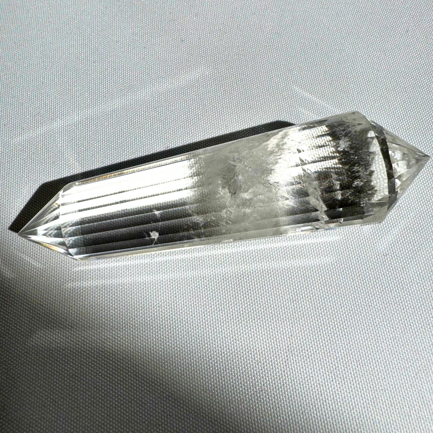 Double-terminated Clear Quartz 24-Sided Vogel wand for focused energy amplification, used in healing, meditation, and metaphysical practices.