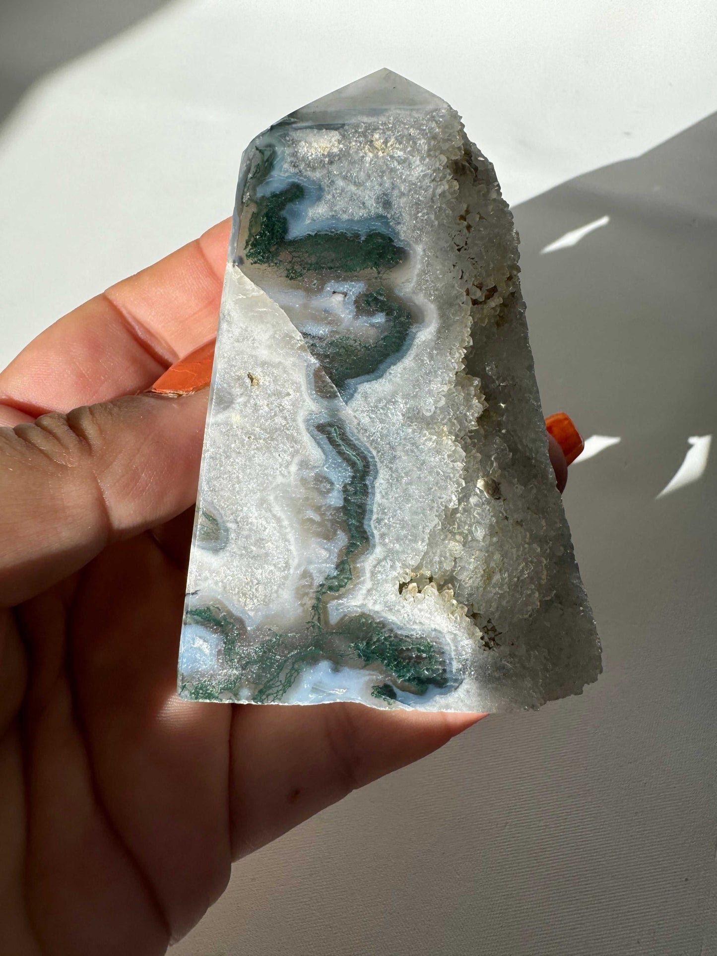 Moss Agate Druze Tower #5 featuring green and white crystalline patterns with sparkling druzy surface, ideal for crystal collectors and home decor.