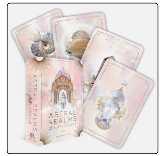 Astral Realms Crystal Oracle card deck with box and five illustrated oracle cards featuring crystals and celestial themes for spiritual guidance.