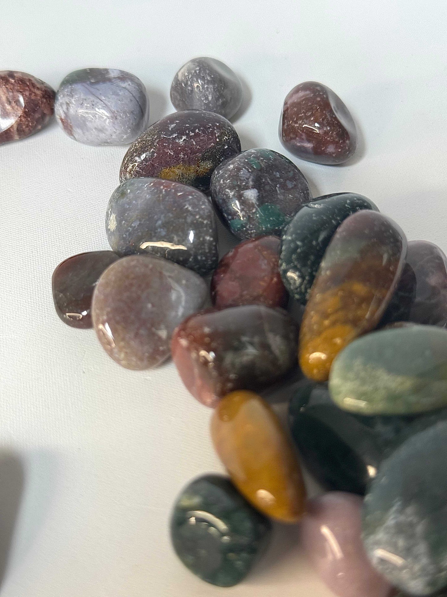 Ocean Jasper Crystal Tumble Stones - Healing Benefits | Self Love. Close-up of vibrant Ocean Jasper tumbles ideal for self-love and relaxation rituals.